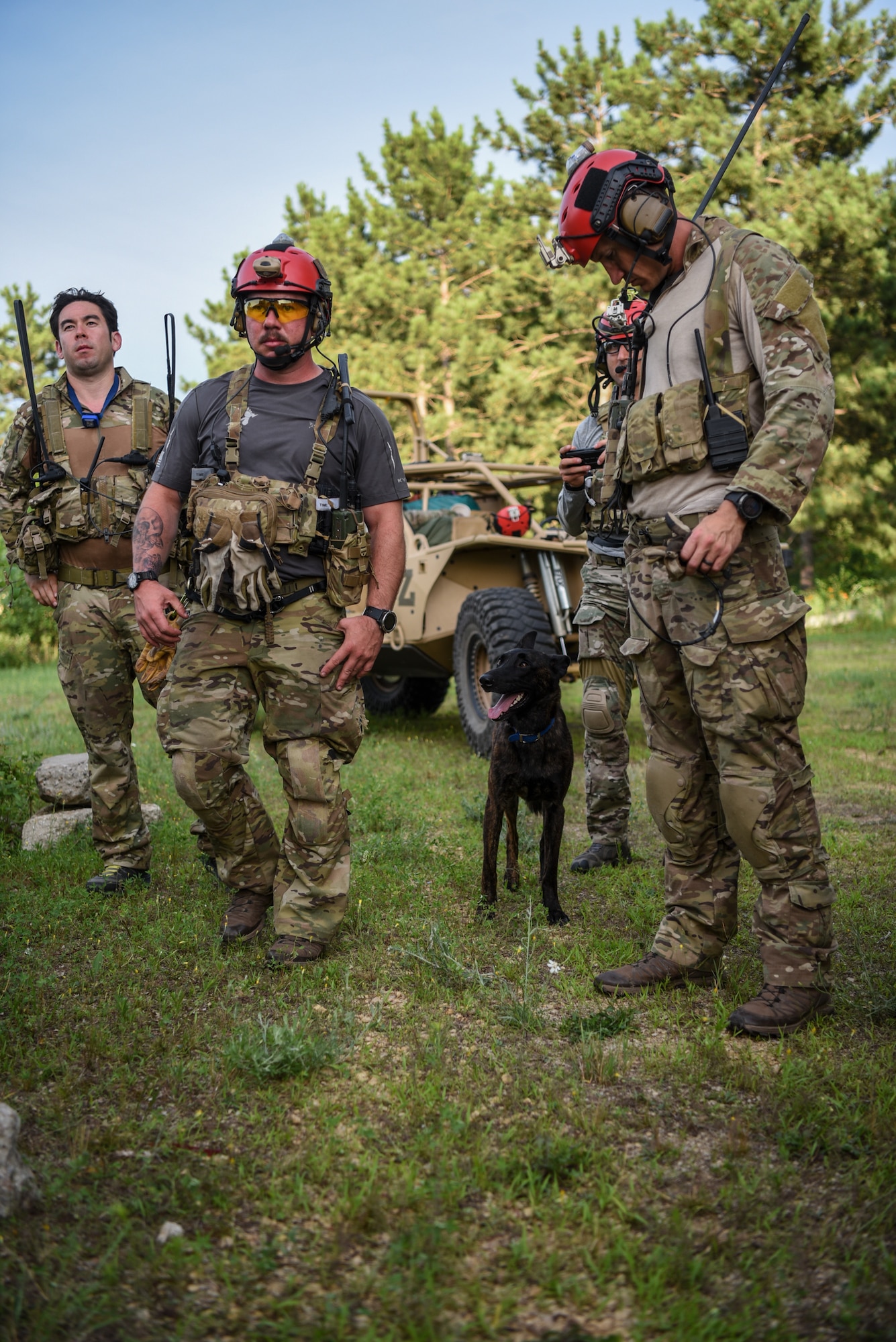 Master Sgt. Rudy Parsons, a pararescueman with the Kentucky Air National Guard’s 123rd Special Tactics Squadron, and Callie, his search and rescue dog, participate in Patriot North, an annual domestic operations exercise designed to provide natural disaster-response training at Volk Field, Wis., July 17, 2019. Callie is currently the only search and rescue dog in the Department of Defense. (U.S. Air National Guard photo by Staff Sgt. Joshua Horton)