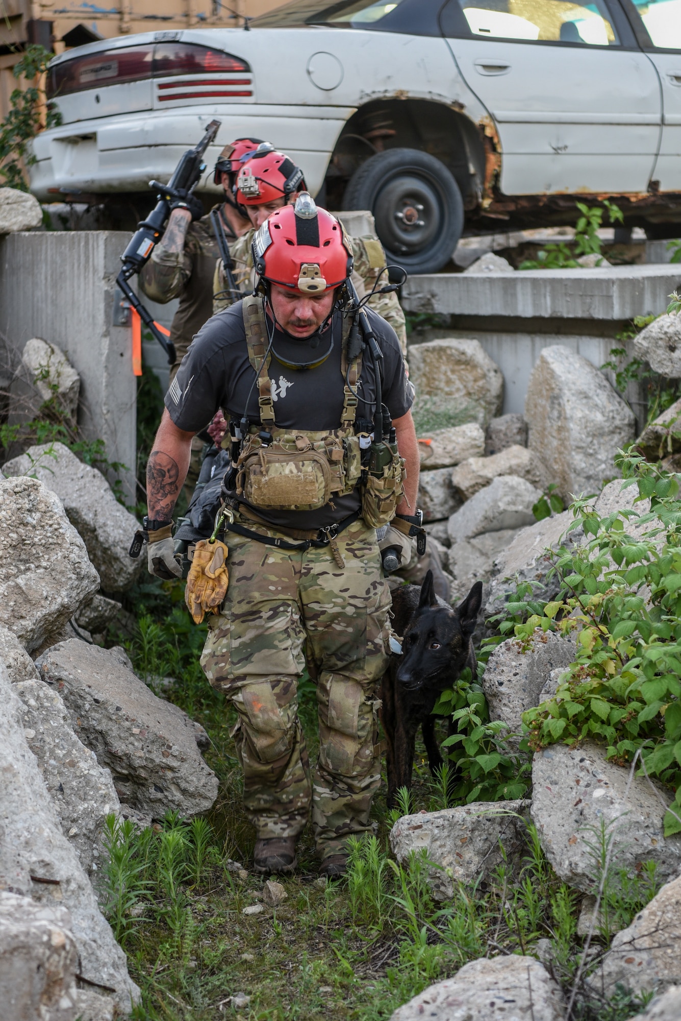 Master Sgt. Rudy Parsons, a pararescueman with the Kentucky Air National Guard’s 123rd Special Tactics Squadron, and Callie, his search and rescue dog, participate in Patriot North, an annual domestic operations exercise designed to provide natural disaster-response training at Volk Field, Wis., July 17, 2019. Callie is currently the only search and rescue dog in the Department of Defense. (U.S. Air National Guard photo by Staff Sgt. Joshua Horton)