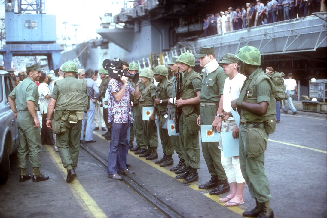 Marines from Company G and Company E, 2nd Battalion, 9th Marines, being interviewed pier side following rescue operation of merchant vessel SS Mayaguez, May 20, 1975 (Gerald R. Ford Presidential Library)