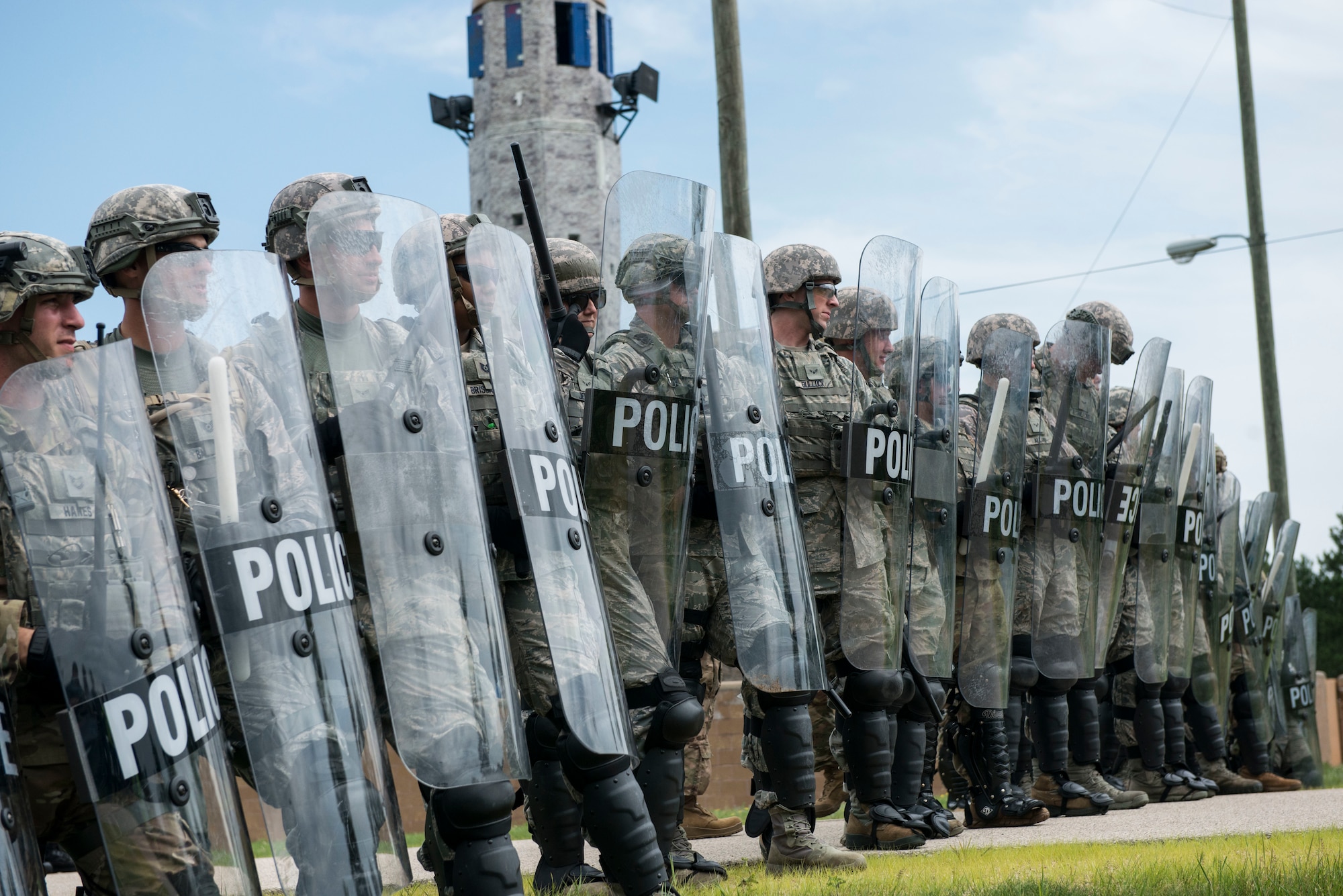 National Guardsmen assigned to the New Hampshire Army National Guard and the New Hampshire and Connecticut  Air National Guard conduct riot control training alongside members of the Wisconsin State Patrol during the PATRIOT North 19 domestic operations exercise, July 18, 2019 at Fort McCoy, WI. PATRIOT North is an annual domestic operations exercise, which tests the ability of the National Guard to work together with local, state and federal entities to respond to emergencies. (U.S. Air National Guard photo by Tech. Sgt. Tamara R. Dabney)