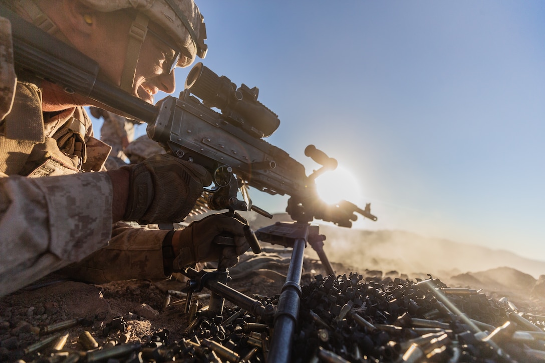 A U.S. Marine with Company I, 3rd Battalion, 7th Marine Regiment, 1st Marine Division, engages a target utilizing the M240G during a squad attack at Marine Corps Air Ground Combat Center, Twentynine Palms, Calif., July 15, 2019. The training was conducted to validate the squad leaders capabilities to lead and control their squads while integrating supporting arms in a deliberate attack.