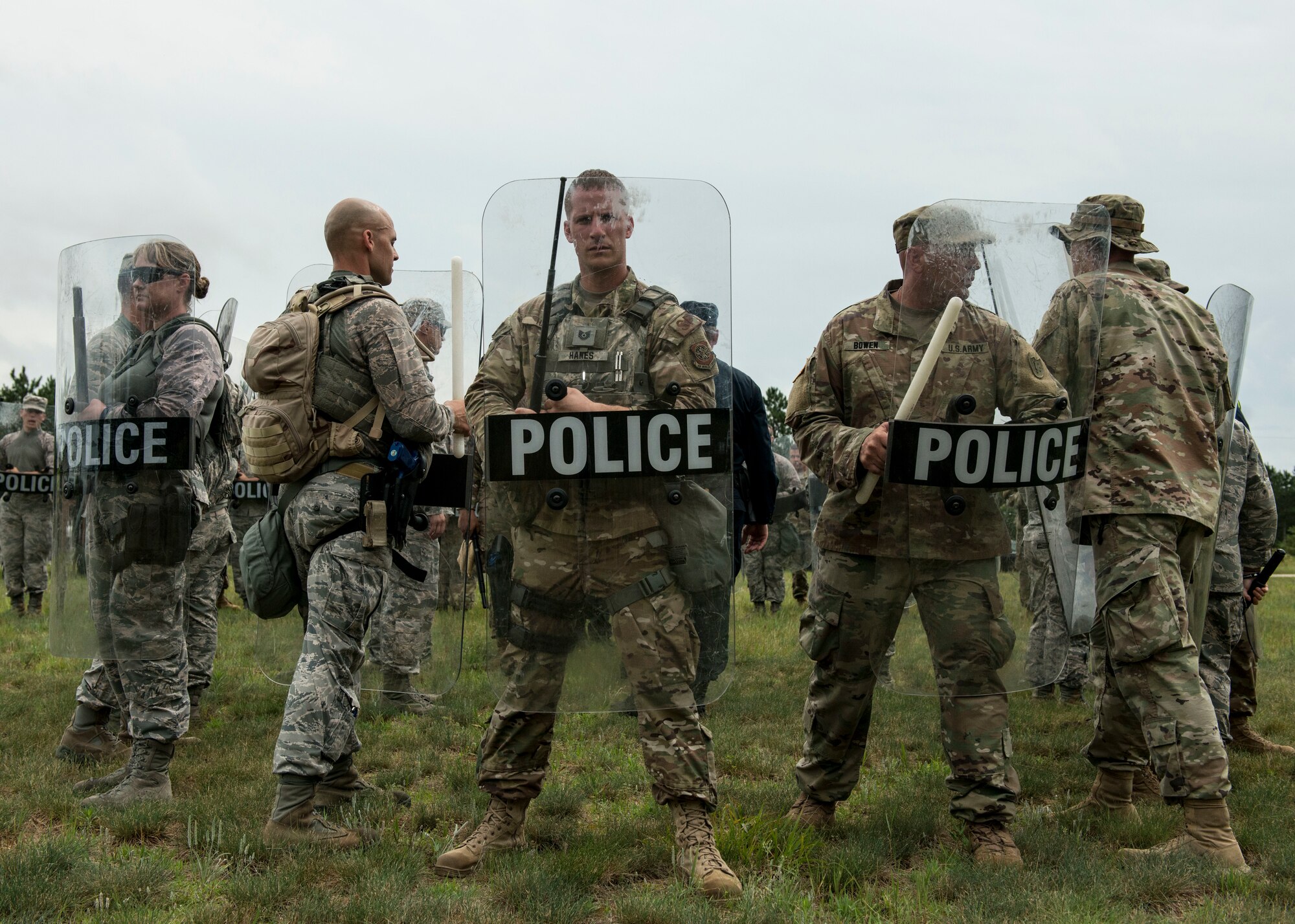 National Guardsmen assigned to the New Hampshire Army National Guard and the New Hampshire and Connecticut  Air National Guard conduct riot control training alongside members of the Wisconsin State Patrol during the PATRIOT North 19 domestic operations exercise, July 18, 2019 at Fort McCoy, WI. PATRIOT North is an annual domestic operations exercise, which tests the ability of the National Guard to work together with local, state and federal entities to respond to emergencies. (U.S. Air National Guard photo by Tech. Sgt. Tamara R. Dabney)