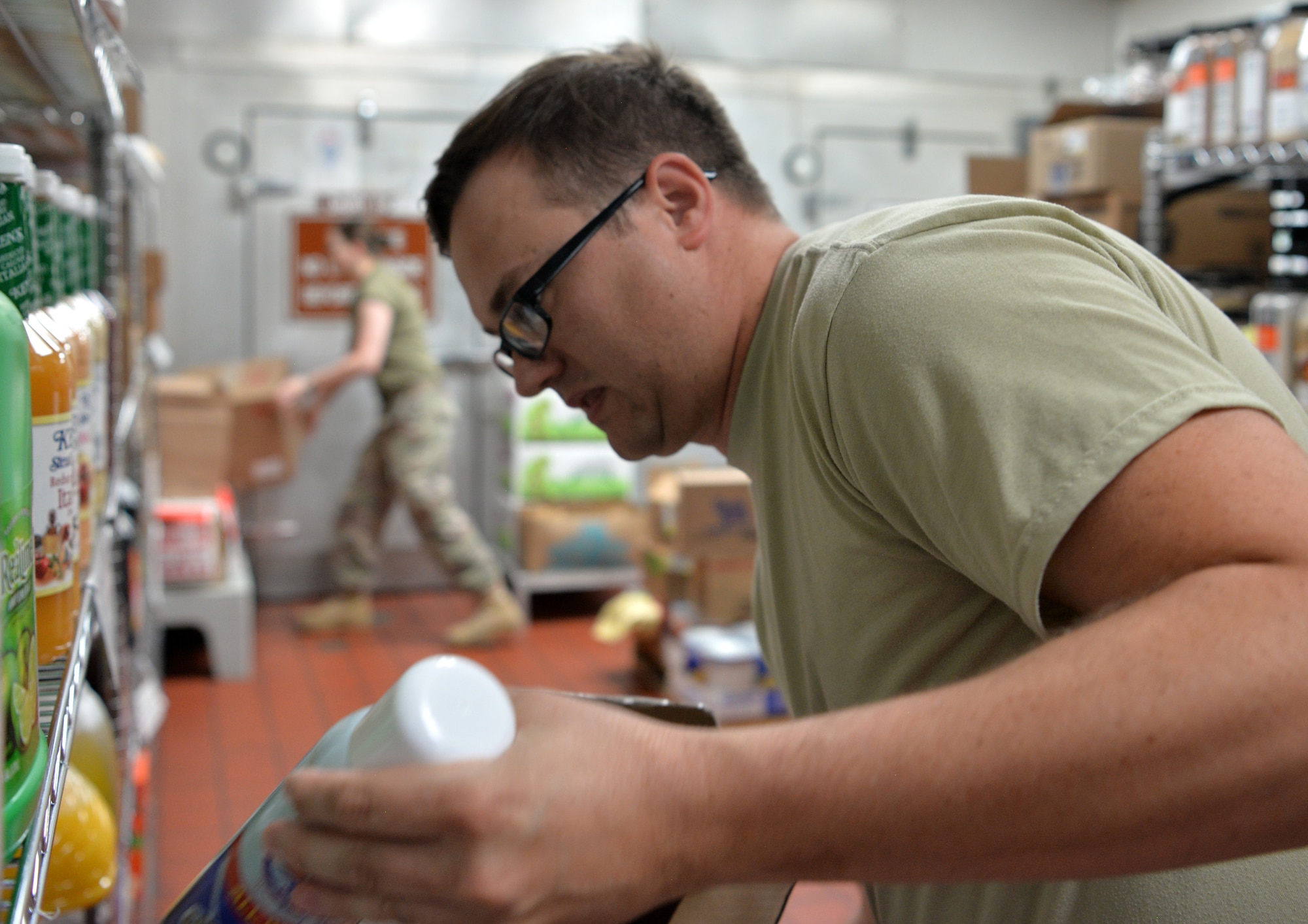 Staff Sgt. Shane Thornton, a storeroom manager, assigned to 99th Force Support Squadron, restocks inventory during Red Flag 19-3 at Nellis Air Force Base, Nev, July 19, 2019. Red Flag is a combat training exercise designed to expose pilots to their first 10 “combat missions”, allowing them to be more confident and effective in real-world combat. (U.S. Air Force photo by Tech. Sgt. Bryan Magee)