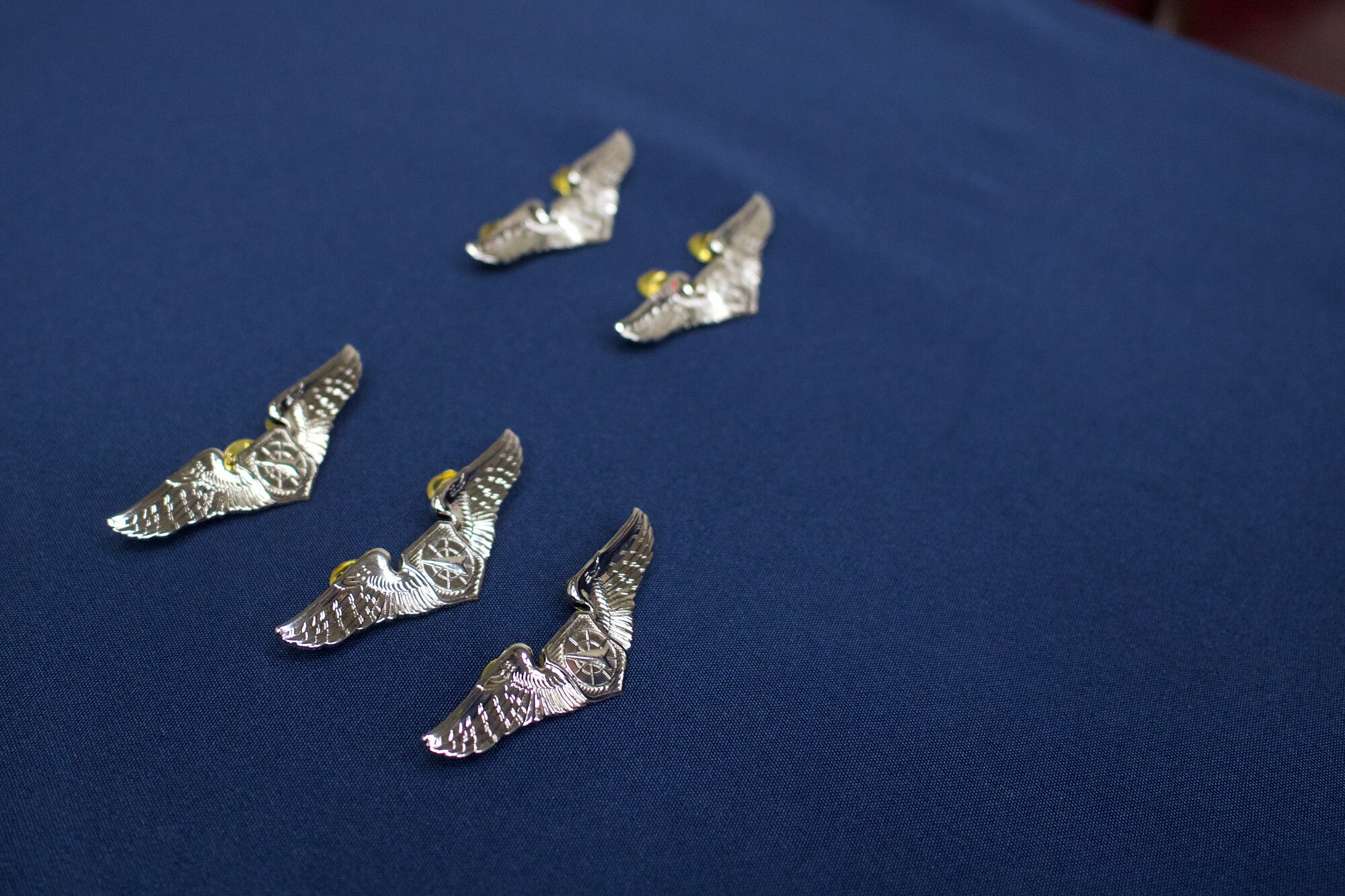 Alaska Air Guard officers pin on ABM wings
