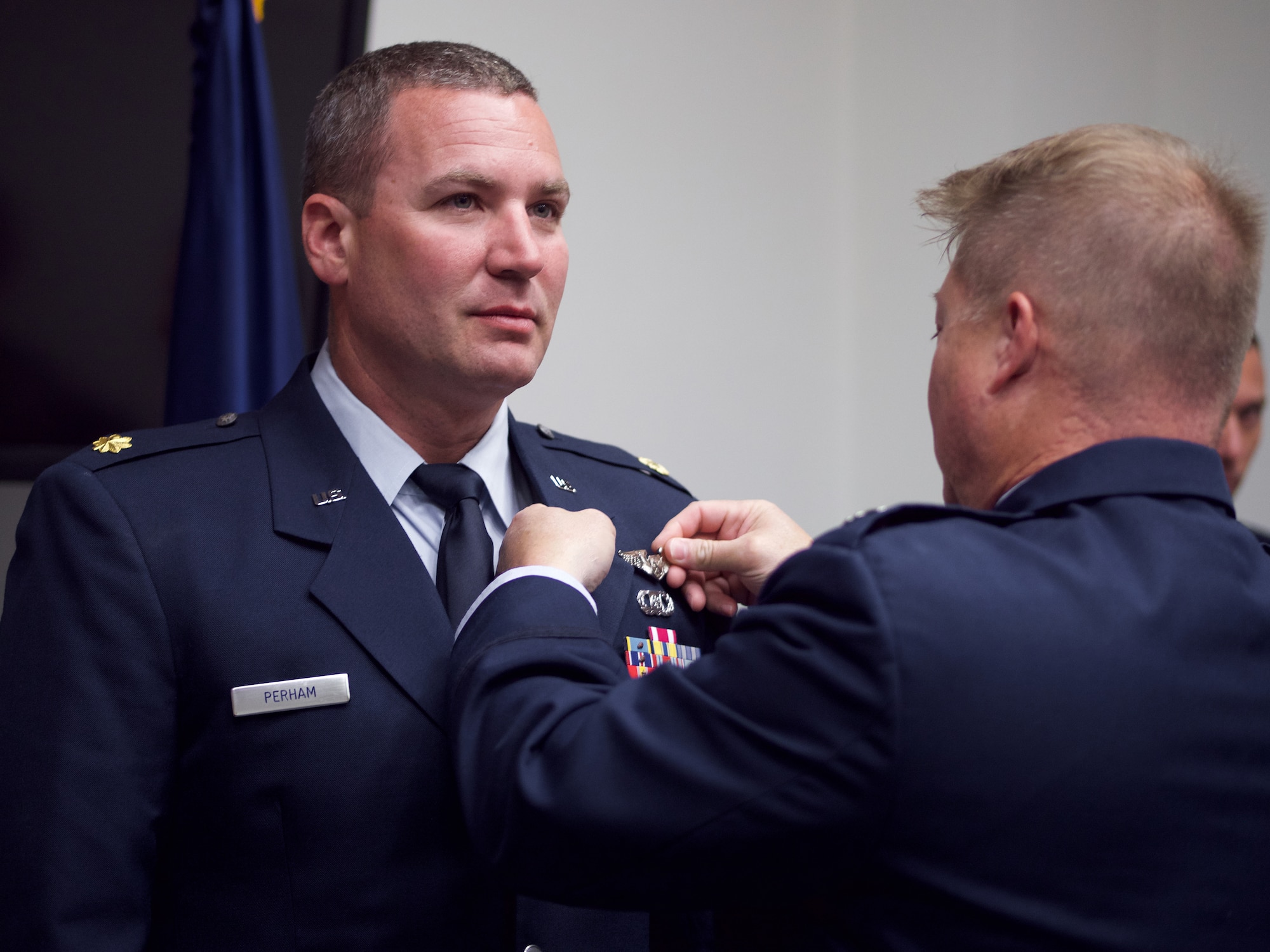 Alaska Air Guard officers pin on ABM wings