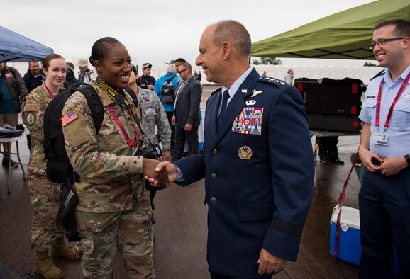 U.S. Army Spc. Jillita Grier-Watford, Armed Forces Network Europe broadcaster, meets Gen. Jeff Harrigian, U.S. Air Forces in Europe and Air Forces Africa commander, conducts an interview during the 2019 Royal International Air Tattoo at RAF Fairford, England, July 19, 2019. This year’s RIAT commemorated the 70th anniversary of NATO and highlighted the United States’ enduring commitment to its European allies. (U.S. Air Force photo by Airman 1st Class Jennifer Zima)