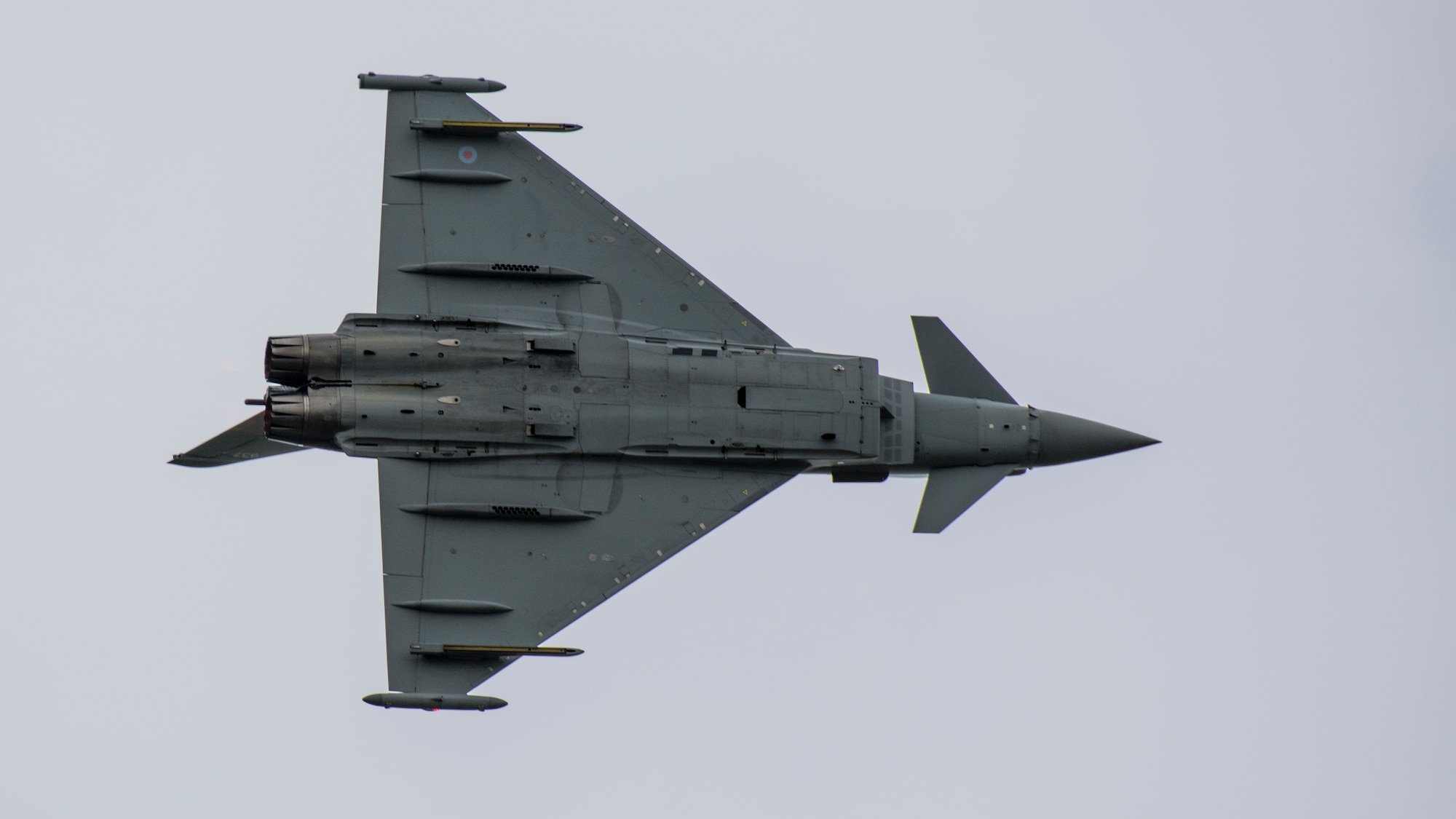 A Royal Air Force Eurofighter Typhoon FGR4 flies past the audience during the 2019 Royal International Air Tattoo at RAF Fairford, England, July 20, 2019. This year, RIAT commemorated the 70th anniversary of NATO and highlighted the United States' enduring commitment to its European allies. (U.S. Air Force photo by Airman 1st Class Jennifer Zima)