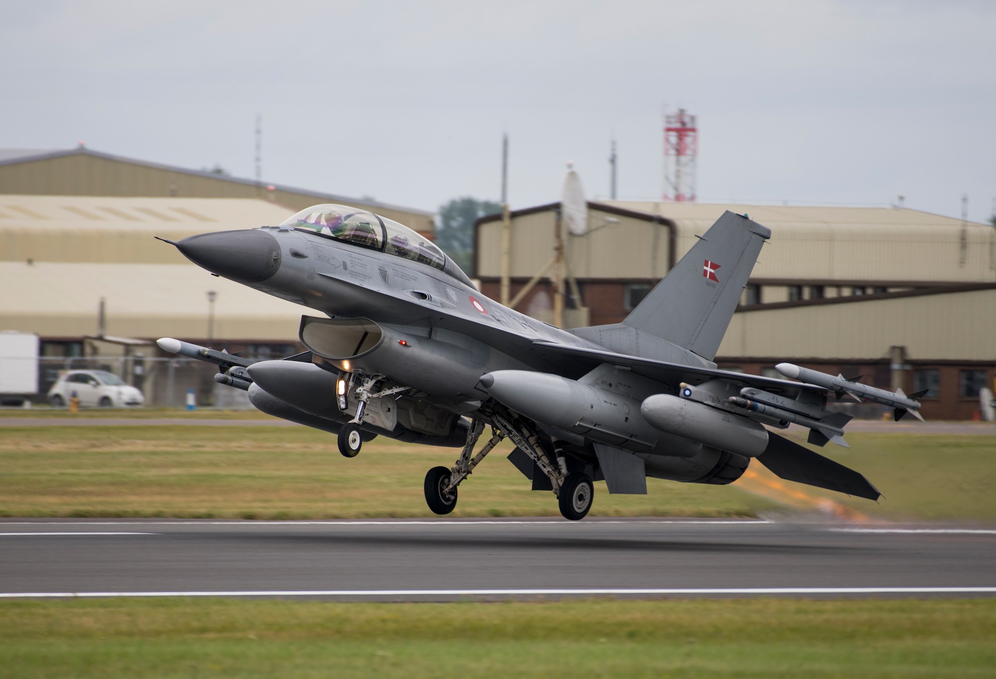 A Danish Air Force General Dynamics F-16AM/BM Fighting Falcon takes off from the runway at the 2019 Royal International Air Tattoo at RAF Fairford, England, July 20, 2019. This year, RIAT commemorated the 70th anniversary of NATO and highlighted the United States' enduring commitment to its European allies. (U.S. Air Force photo by Airman 1st Class Jennifer Zima)