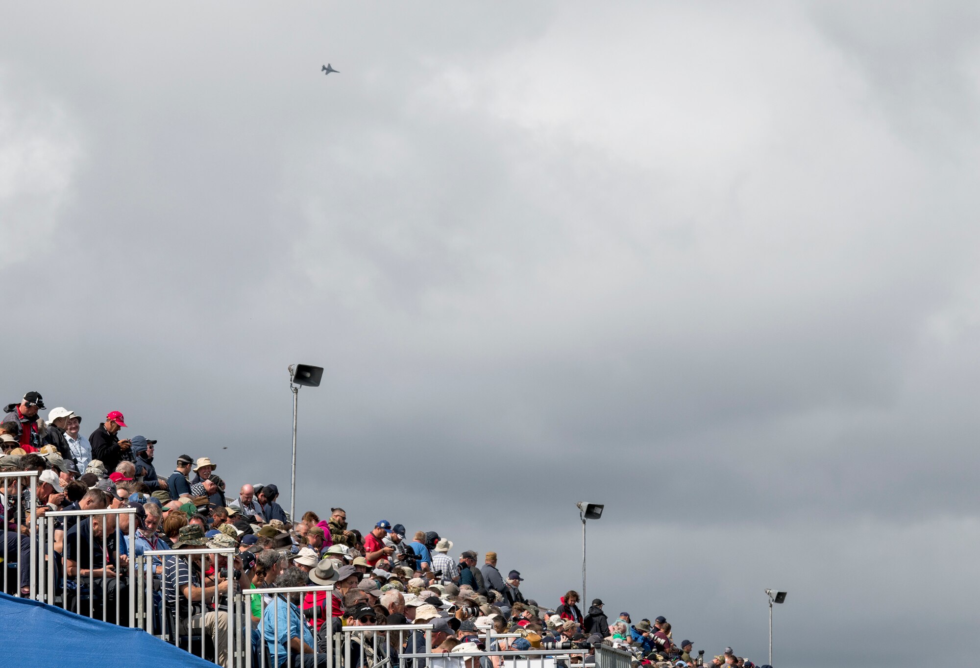 Thousands of attendees watch the aerial demonstrations during the 2019 Royal International Air Tattoo at RAF Fairford, England, July 20, 2019. This year’s RIAT commemorated the 70th Anniversary of NATO and highlighted the United State’s enduring commitment to its European allies. (U.S. Air Force photo by Airman 1st Class Jennifer Zima)