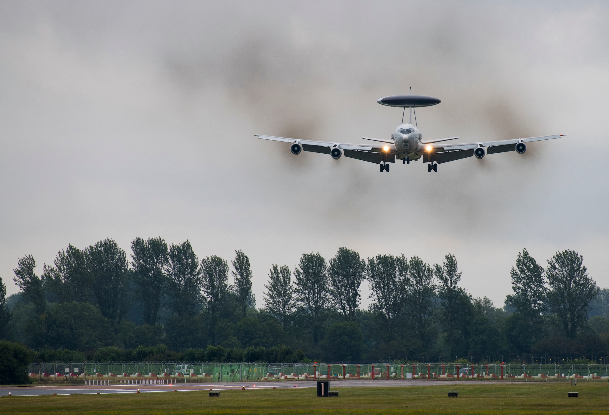 A NATO Airborne Early Warning and Control Force Boeing E-3A Sentry from Geilenkirchen, Germany, approaches for a landing during the 2019 Royal International Air Tattoo at RAF Fairford, England, July 19, 2019. This year, RIAT commemorated the 70th anniversary of NATO and highlighted the United States' enduring commitment to its European allies. (U.S. Air Force photo by Airman 1st Class Jennifer Zima)
