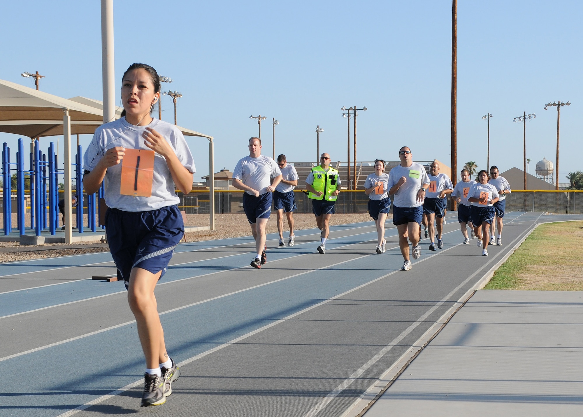Airmen from the 944th Fighter Wing, perform the aerobic portion of their fitness assesment Aug. 7, 2011 at Luke Air Force Base, Ariz. (U.S. Air Force photo by Staff Sgt. Louis Vega Jr.)