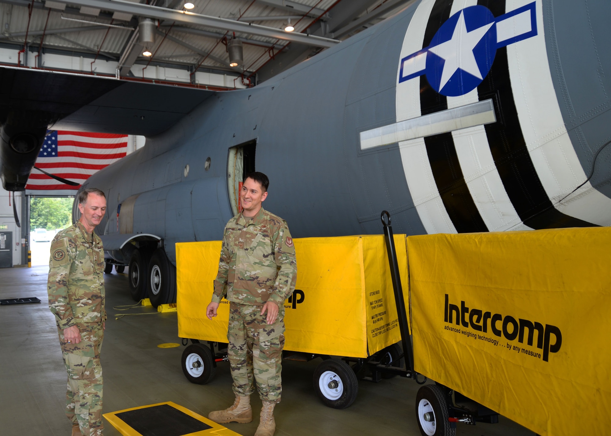 U.S. Air Force Lt. Gen. Warren Berry, deputy chief of staff for Logistics, Engineering and Force Protection, Headquarters U.S. Air Force, Arlington, Va., receives a brief from U.S. Air Force Tech. Sgt. Neil Ortiz, 86th Maintenance Group quality assurance manager on Ramstein Air Base, Germany, July 18, 2019. Berry toured the 86th Civil Engineer Group, 86th Maintenance Squadron, 86th Logistics Readiness Squadron, 86th Munitions Squadron, and 86th Security Forces Squadron. (U.S. Air Force photo by Tech. Sgt. J. Smith)