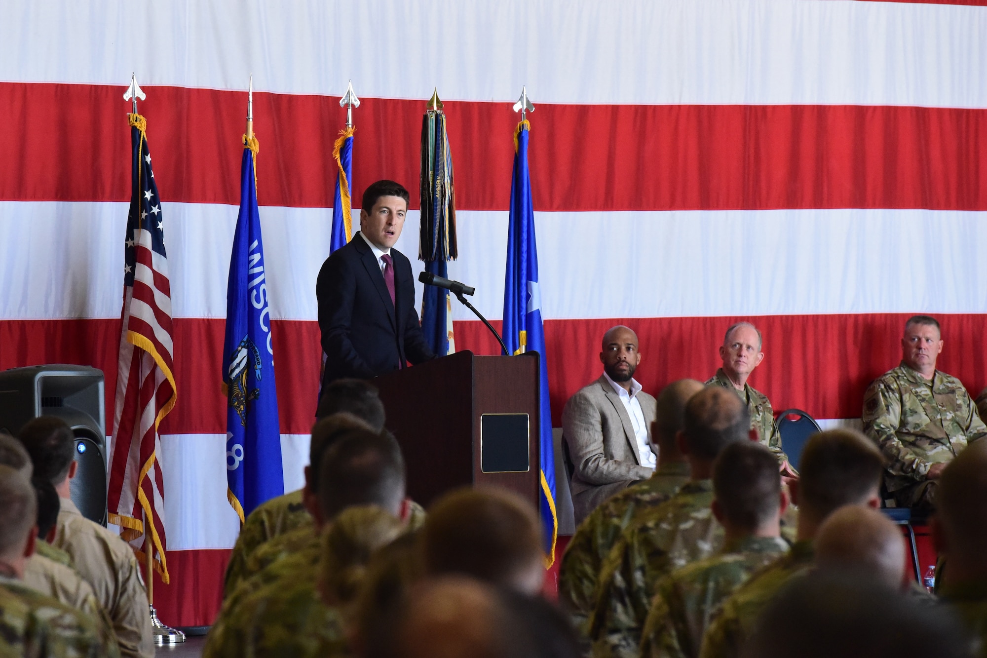 U.S. Representative Bryan Steil, 1st District of Wisconsin, speaks to deploying members of the 115th FIghter Wing at a send off ceremony at Truax Field, Madison, Wis. on July 21, 2019.  The 115th Fighter Wing deployed approximately 300 personnel and a number of aircraft to Afghanistan in support of Operation Freedom Sentinel and NATO's Resolute Support. (U.S. Air National Guard photo by Staff Sgt. Kyle Russell)
