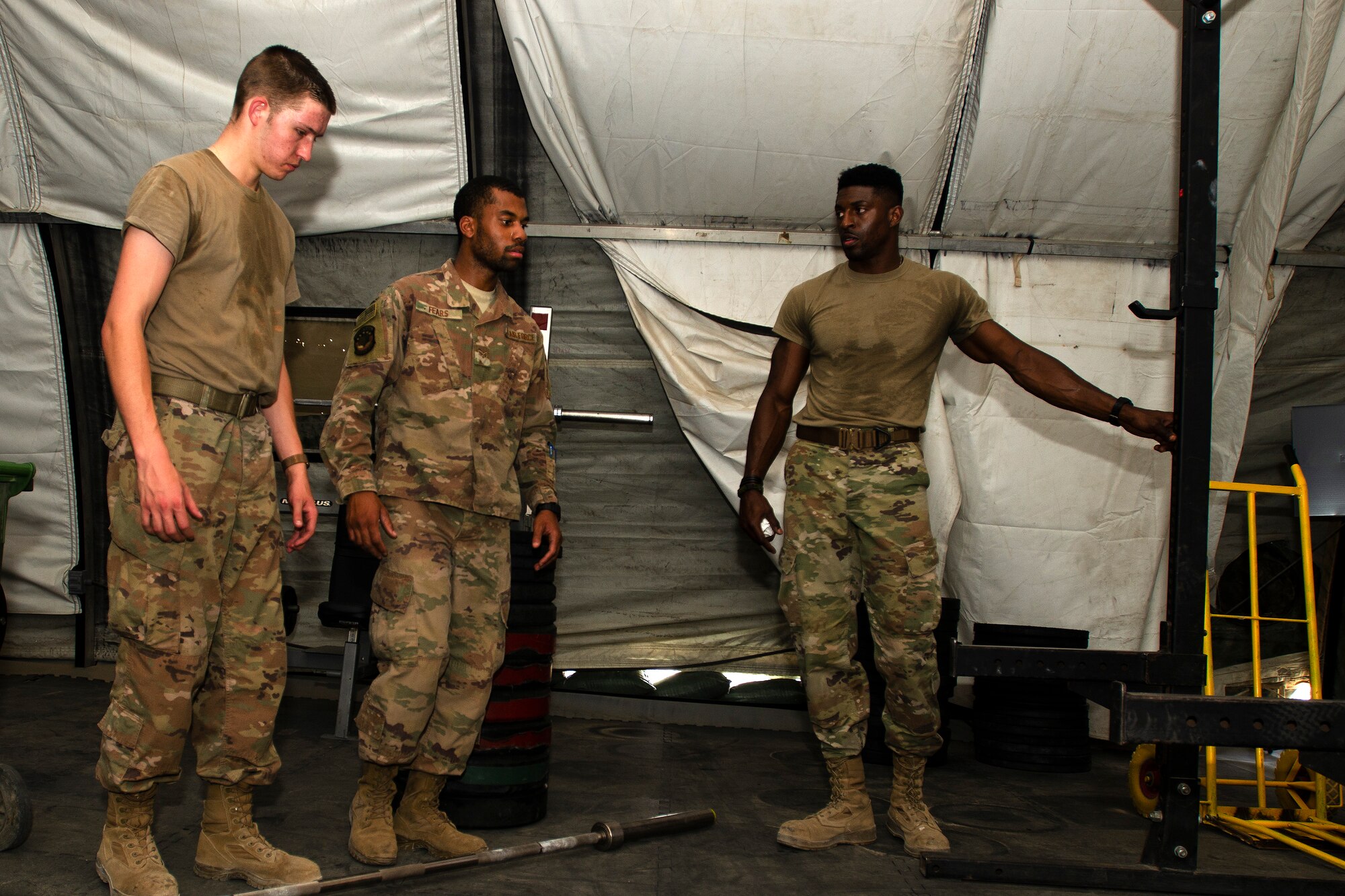 Airmen with the 386th Expeditionary Force Support Squadron set up the new temporary fitness tent on Ali Al Salem Air Base, Kuwait, July 24, 2019. The new fitness tent is slated to open Aug.1, 2019, replacing the original facility which is scheduled for demolition to make room for future base improvement projects. This facility offers Airmen a second fitness location and expected to be in use until mid-November when the more permanent structure is completed. (U.S. Air Force photo by Capt. Stephen Hudson)