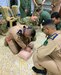 U.S. Army Lt. Col. Natalie Nevins, 244th Combat Aviation Brigade Command Flight Surgeon, Task Force Warhawk, and her medical team, conducted hands on mentoring on the basics of lifesaving treatment at the Iraqi Taji Airbase, Amber Zone, to helicopter pilots from the Iraqi Army Aviation Squadron 55 unit, June 17-20, 2019. Multiple Coalition training task forces continue to train and equip Iraqi security forces which in turn are keeping the pressure on Daesh.