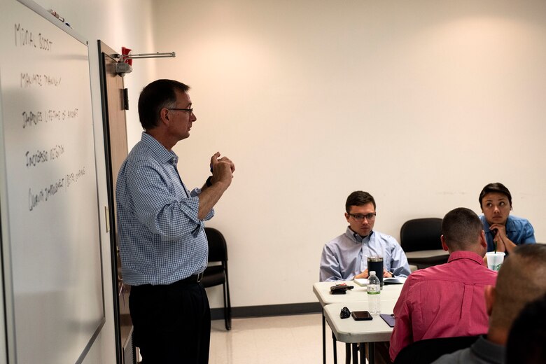 David Charron, University of California, Berkeley professor and one of the instructors for the event, teaches during a National Security Innovation Network “Innovation Bootcamp” course, July 23, 2019, at Moody Air Force Base, Ga. Over the four-day bootcamp, 29 Airmen learned how to apply innovative solutions to Moody specific challenges under guidance of a team from Berkeley. (U.S. Air Force photo by Senior Airman Erick Requadt)