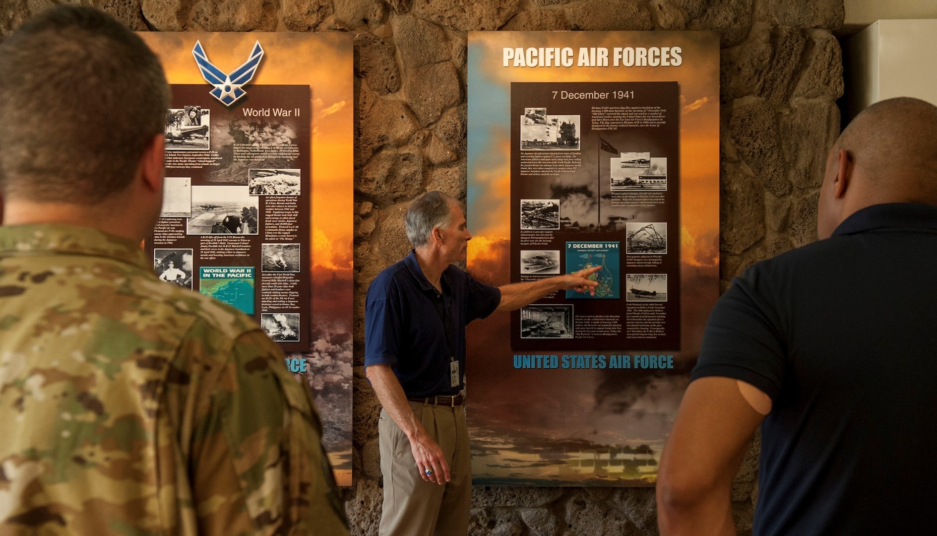 Charles Nicholls, Pacific Air Forces historian, gives an account of the Pearl Harbor attack for members of the 12th Operations Support Squadron and 559th Flying Training Squadron, from Joint Base San Antonio-Randolph, during a history tour at Headquarters PACAF, Joint Base Pearl Harbor-Hickam, Hawaii, July 10. The purpose of the visit was for Air Education and Training Command members to learn more about Pacific theater operations and build and a relationship between AETC as a major command and PACAF as a combatant command.