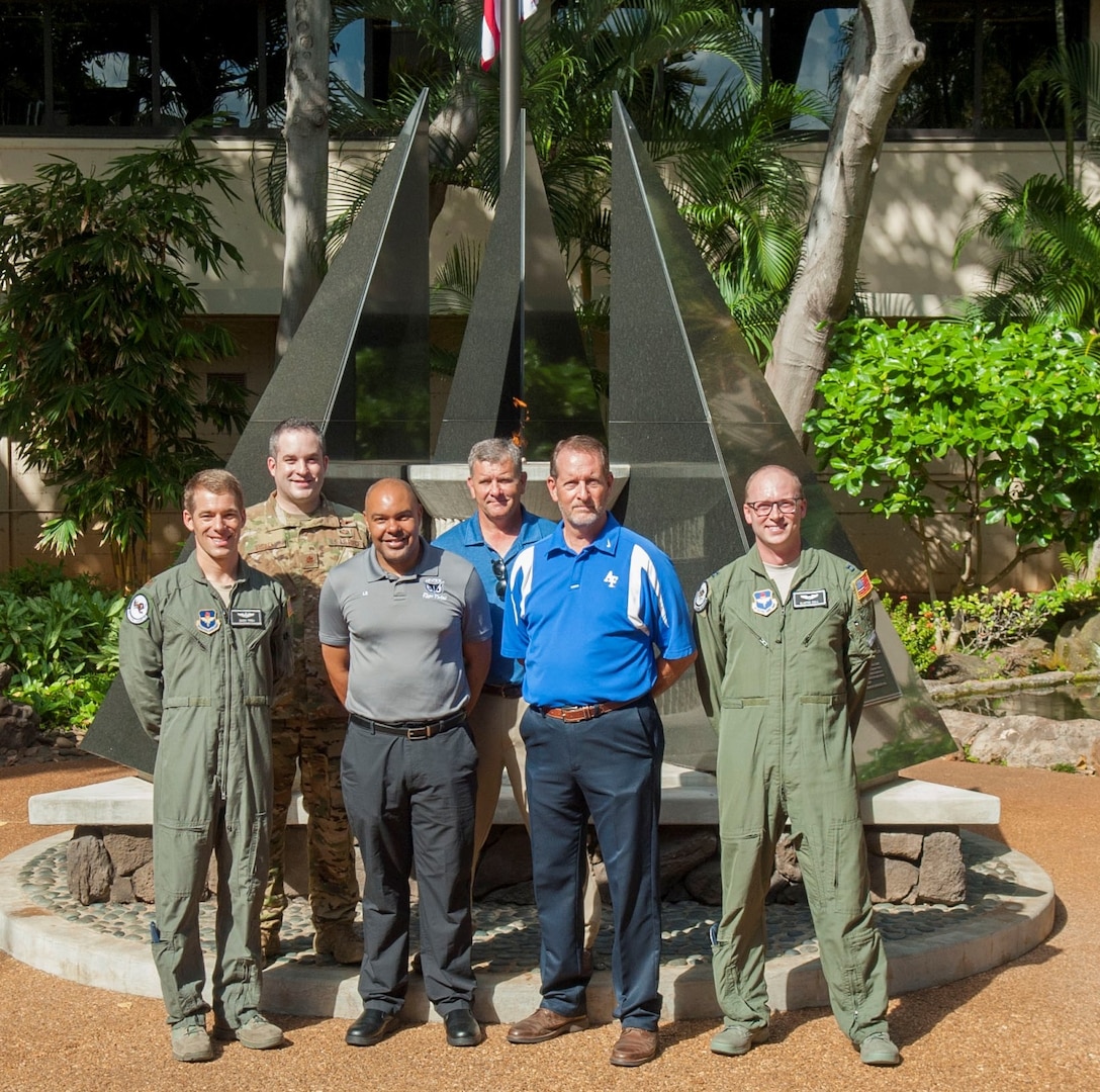 Members of the 12th Operations Support Squadron and 559th Flying Training Squadron from Joint Base San Antonio-Randolph pose for a group photo during a history tour at Headquarters Pacific Air Forces, Joint Base Pearl Harbor-Hickam, Hawaii, July 10, 2019. The purpose of the visit was for Air Education and Training Command members to learn more about Pacific theater operations and build and a relationship between AETC as a major command and PACAF as a combatant command.