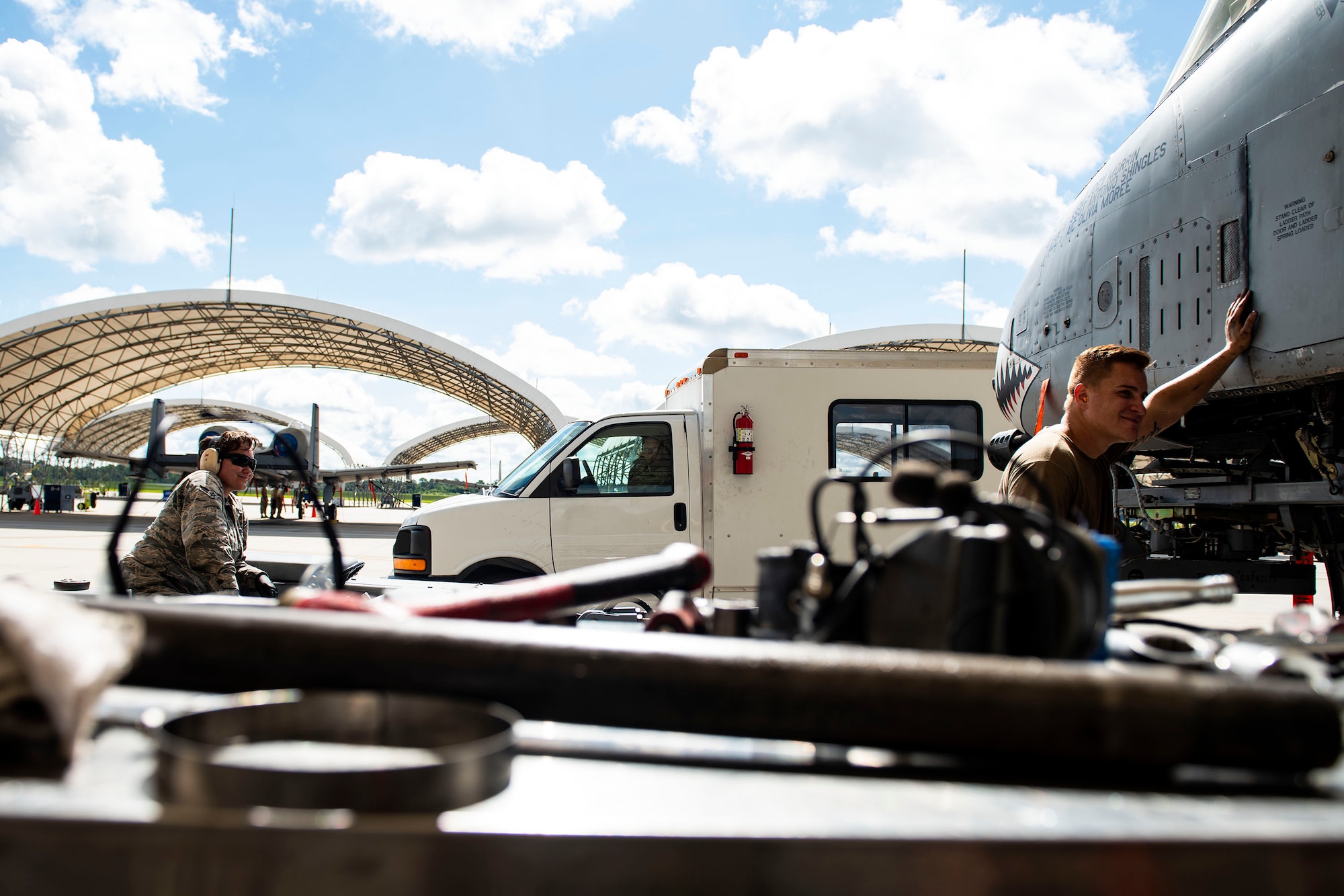 Airmen from the 74th Aircraft Maintenance Unit prepare to lower a 30mm GAU-8 Gatling Gun system during unscheduled maintenance, July 23, 2019, at Moody Air Force Base, Ga. Unscheduled maintenance occurs when discrepancies are discovered with A-10C Thunderbolt II weapon systems. These repairs aid in reducing down time of the aircraft and supporting sustained operations tempo. (U.S. Air Force photo by Senior Airman Erick Requadt)
