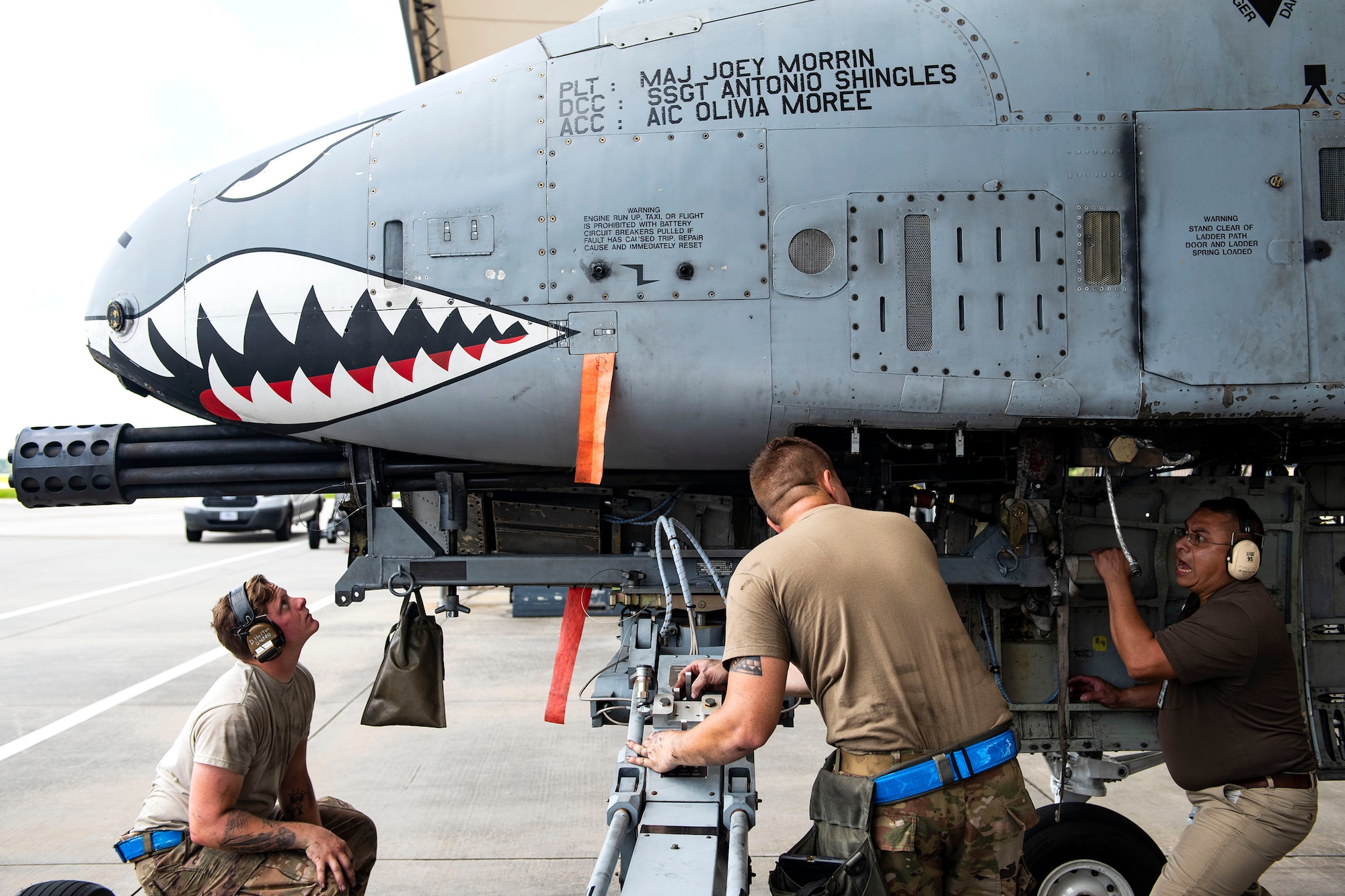 Airmen from the 74th Aircraft Maintenance Unit lower a 30mm GAU-8 Gatling Gun system during unscheduled maintenance, July 23, 2019, at Moody Air Force Base, Ga. Unscheduled maintenance occurs when discrepancies are discovered with A-10C Thunderbolt II weapon systems. These repairs aid in reducing down time of the aircraft and supporting sustained operations tempo. (U.S. Air Force photo by Senior Airman Erick Requadt)