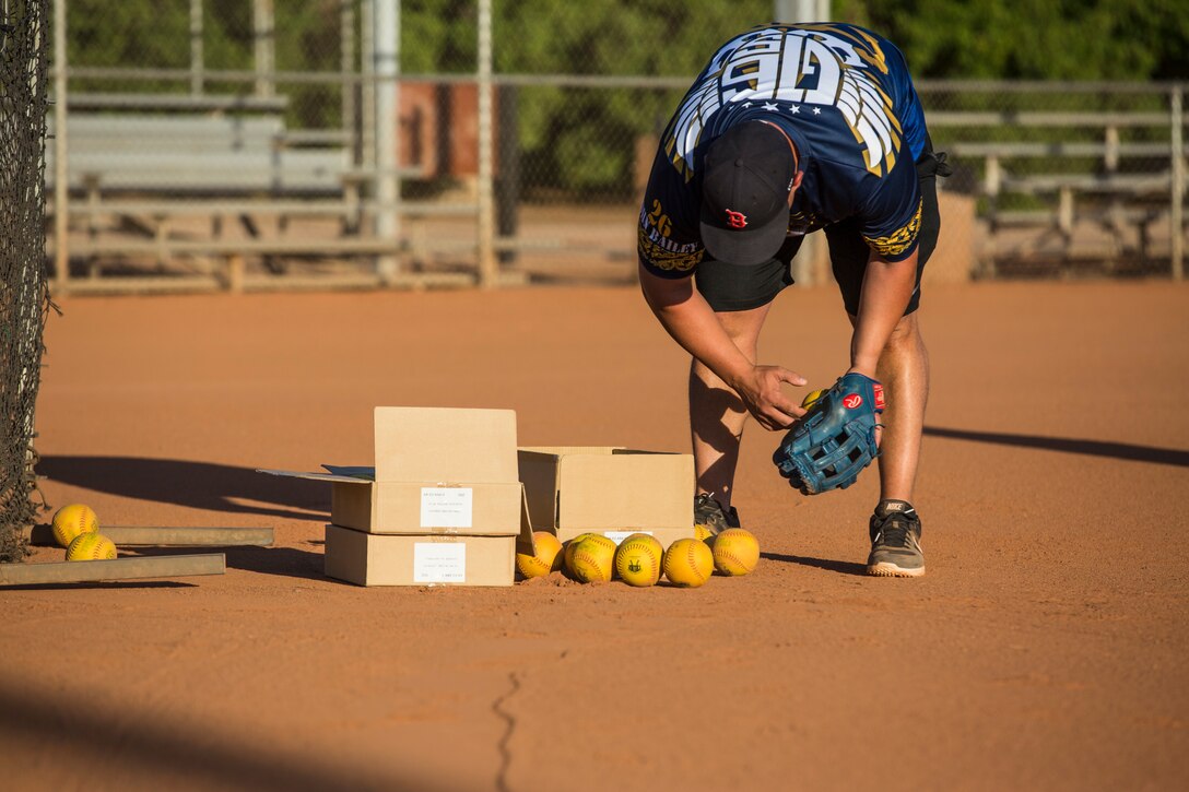 U.S. Marines, Sailors, and DoD employees participate in the Intramural Summer-Season Softball Home-Run Derby on Marine Corps Air Station Yuma, Ariz., July 1, 2019. The derby was hosted by Marine Corps Community Services (MCCS) as a friendly competition between the intramural softball teams to kick off their playoff season. (U.S. Marine Corps photo by Sgt. Isaac D. Martinez)