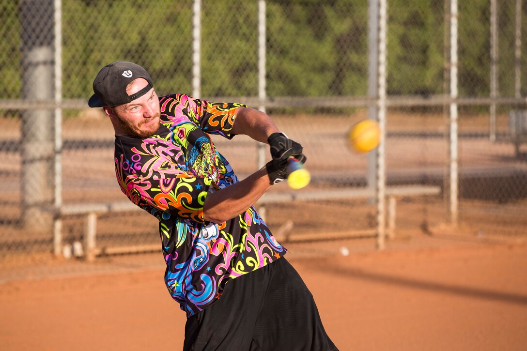 U.S. Marines, Sailors, and DoD employees participate in the Intramural Summer-Season Softball Home-Run Derby on Marine Corps Air Station Yuma, Ariz., July 1, 2019. The derby was hosted by Marine Corps Community Services (MCCS) as a friendly competition between the intramural softball teams to kick off their playoff season. (U.S. Marine Corps photo by Sgt. Isaac D. Martinez)