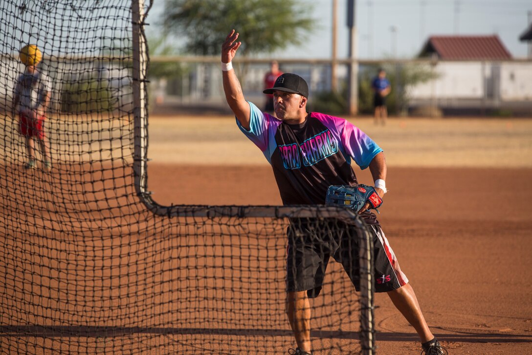 U.S. Marines, Sailors, and DoD employees participate in the Intramural Summer-Season Softball Home-Run Derby on Marine Corps Air Station Yuma, Ariz., July 1, 2019. The derby was hosted by Marine Corps Community Services (MCCS) as a friendly competition between the intramural softball teams to kick off their playoff season. (U.S. Marine Corps photo by Sgt. Isaac D. Martinez)