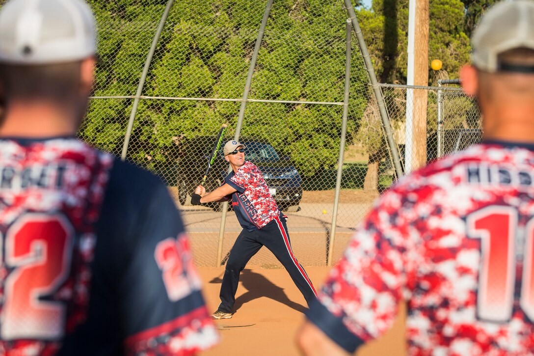 U.S. Marines, Sailors, and DoD employees participate in the Intramural Summer-Season Softball Home-Run Derby on Marine Corps Air Station Yuma, Ariz., July 1, 2019. The derby was hosted by Marine Corps Community Services (MCCS) as a friendly competition between the intramural softball teams to kick off their playoff season. (U.S. Marine Corps photo by Sgt. Isaac D. Martinez)