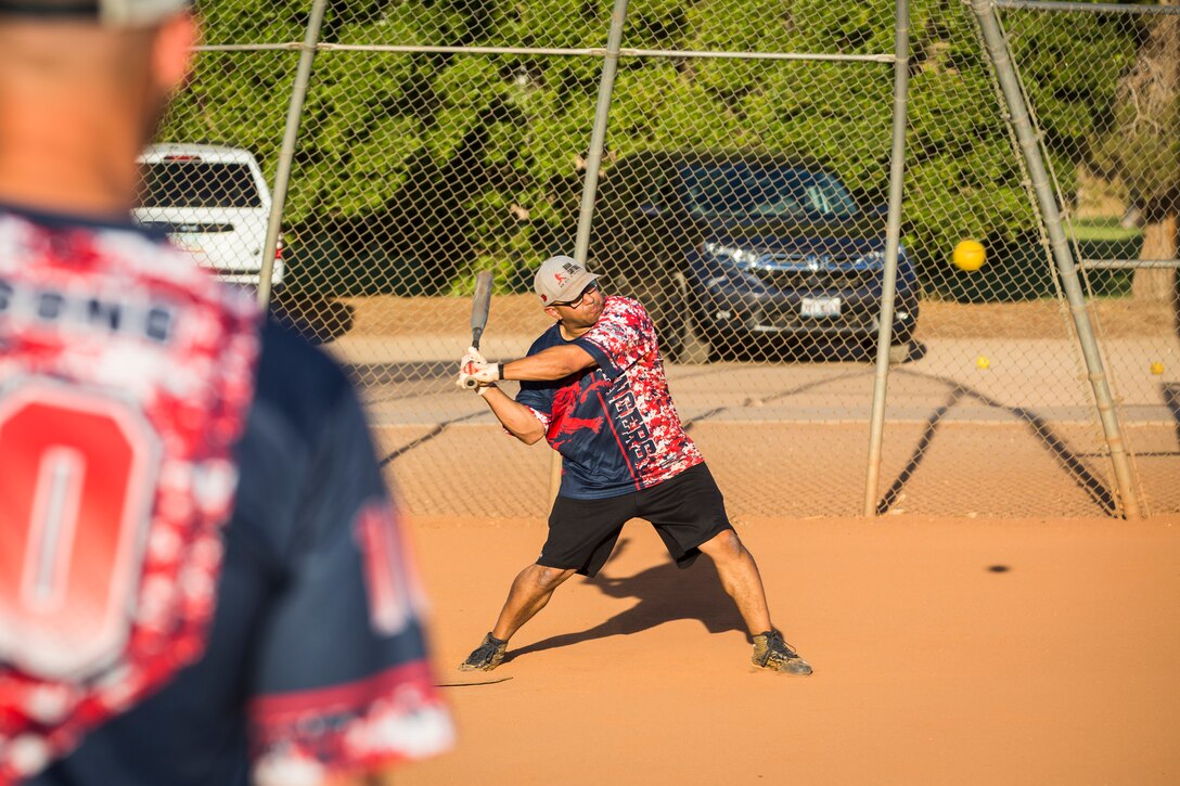 U.S. Marines, Sailors, and DoD employees participate in the Intramural Summer-Season Softball Home-Run Derby on Marine Corps Air Station Yuma, Ariz., July 1, 2019. The derby was hosted by Marine Corps Community Services (MCCS) as a friendly competition between the intramural softball teams to kick off their playoff season. (U.S. Marine Corps photo by Sgt. Isaac D. Martinez)