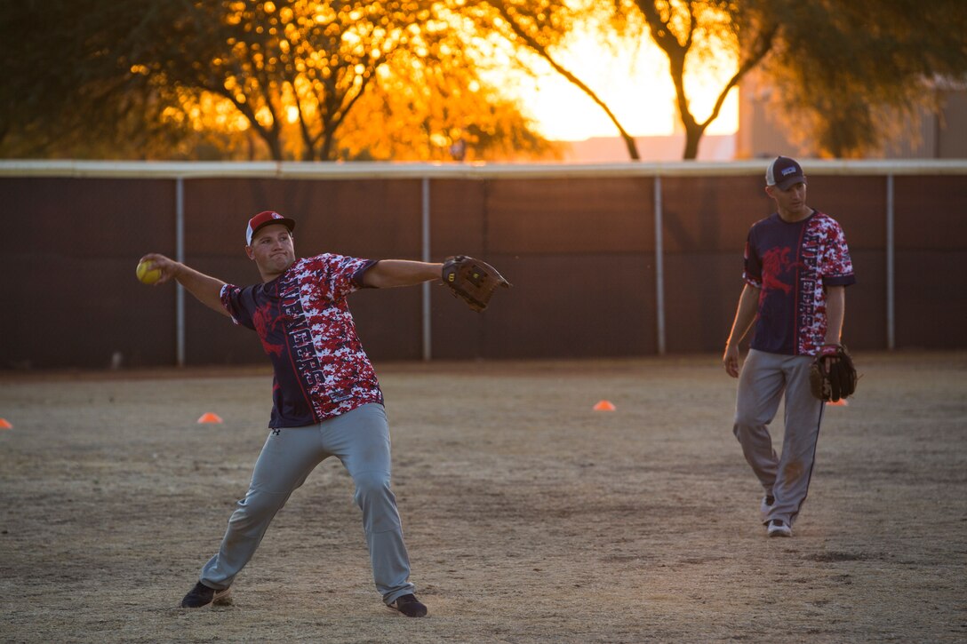 U.S. Marines, Sailors, and DoD employees participate in the Intramural Summer-Season Softball Home-Run Derby on Marine Corps Air Station Yuma, Ariz., July 1, 2019. The derby was hosted by Marine Corps Community Services (MCCS) as a friendly competition between the intramural softball teams to kick off their playoff season. (U.S. Marine Corps photo by Sgt. Isaac D. Martinez)