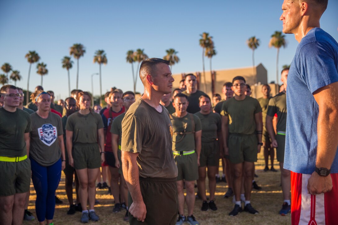 U.S. Marines with Headquarters and Headquarters Squadron (H&HS) participate in an Independence Day Motivational Run at Marine Corps Air Station Yuma, Ariz., July 3, 2019. After the run, Marines throughout the squadron were awarded and recognized for various accomplishments. (U.S. Marine Corps photo by Cpl. Sabrina Candiaflores)