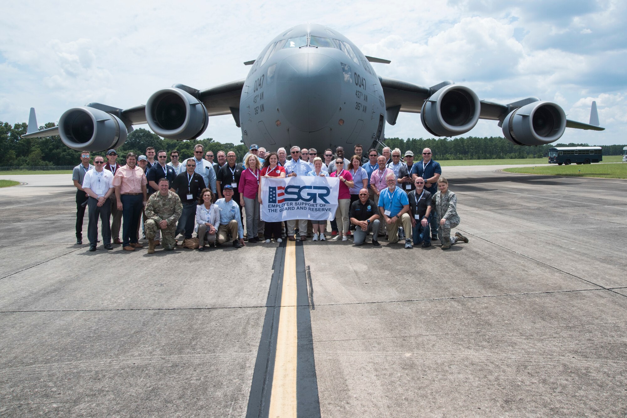 The 315th Airlift Wing takes to the Carolina sky for an Employer Airlift mission July 24, 2019, at Joint Base Charleston. 
At 1,000 feet altitude, 40 Employer Support of the Guard and Reserve employers of S.C. are faceted and secured along the seats of a C-17 Globemaster III as the rear ramp began to open up to reveal the Charleston shores below. The view of Fort Sumter, Folly Beach and the Charleston Peninsula mid-flight displayed the aviation acrobatics and skills that our Guardsmen and Reserve Airmen maintain throughout their monthly duties in South Carolina.
	With this firsthand understanding, the SC ESGR employers experienced superior air power. “It’s important for us to have the support of our employers to do what we do,” said Col. Lamar Thigpen, 315 AW vice commander.