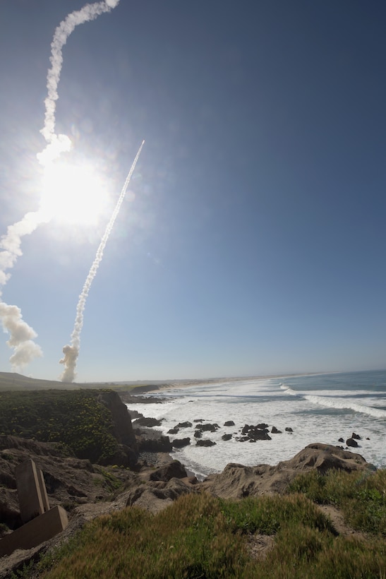 Two long-range ground-based interceptors launched from Vandenberg Air Force Base, California, March 25, 2019, in first-ever salvo engagement test of threat-representative intercontinental ballistic missile target successfully intercept target launched from Ronald Reagan Ballistic Missile Defense Test Site on Kwajalein Atoll (Defense Missile Agency/Lisa Simunaci)