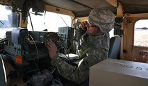 Soldiers in the field learn how to operate in a navigation warfare, or NAVWAR, environment by U.S. Army Space and Missile Defense Command/Army Forces Strategic Command training teams. The command is the Army’s representative to identify and advocate for positioning, navigation and timing information as well as establish and formalize joint NAVWAR requirements. (Ronald Bailey)