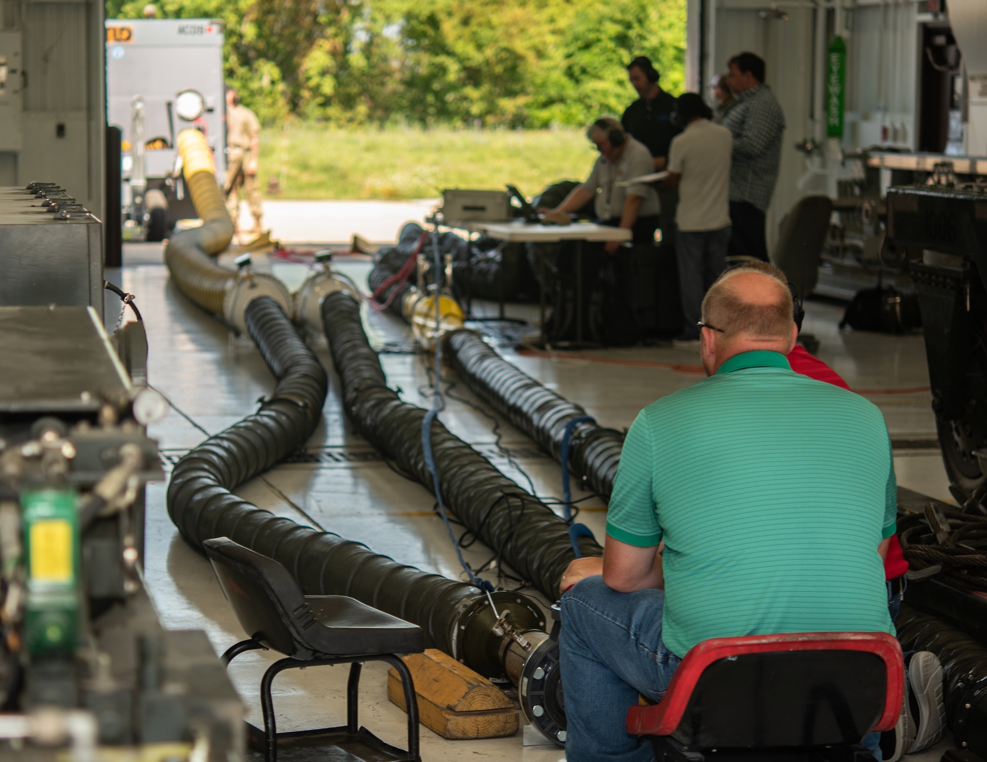 Members from the Air Force Material Command and the Dayton Research Institute,  test a potential B-2 HVAC system for the B-2 Spirit Stealth Bomber on July 18, 2019, at Whiteman Air Force Base, Missouri. A total of five HVAC carts are being tested in 15 different configurations in order to determine, which cooling option will best fit the B-2 mission. (U.S. Air Force photo by Senior Airman Thomas Barley)