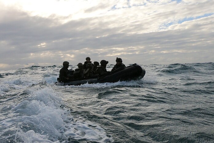 Marines with Battalion Landing Team, 2nd Battalion, 1st Marines, 31st Marine Expeditionary Unit, ride ashore in a Combat Rubber Raiding Craft during a boat raid exercise in the Coral Sea, July 3, 2019. The Marines launched from the amphibious dock landing ship USS Ashland, part of the Wasp Amphibious Ready Group, with embarked 31st MEU, while operating in the Indo-Pacific region to enhance interoperability with partners and serve as a ready-response force for any type of contingency, while simultaneously providing a flexible and lethal crisis response force ready to perform a wide range of military operations.
