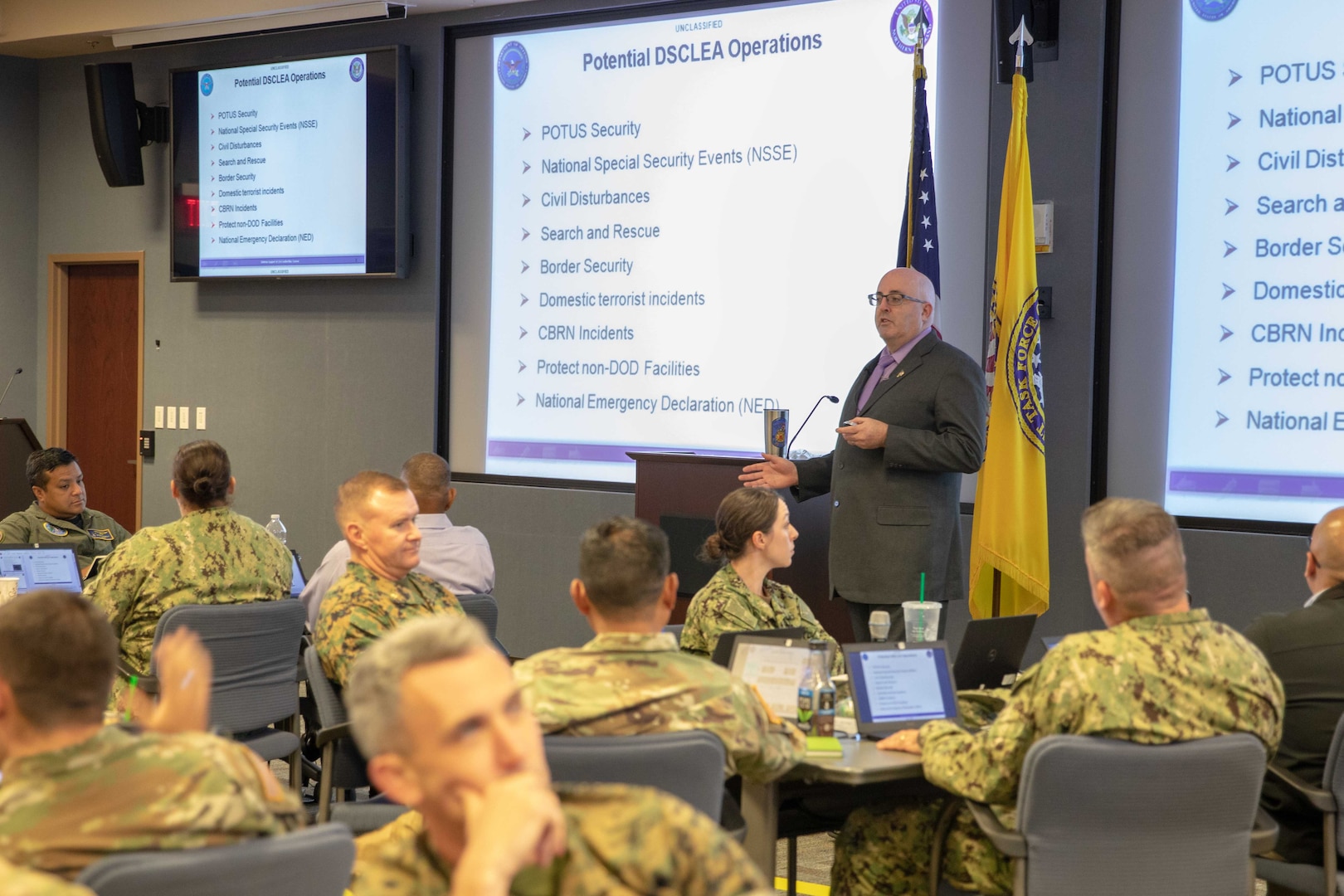 Mr. Sean Francis, Defense Support of Civil Support Authorities (DSCA) course instructor from Army North (ARNORTH), speaks to students from the DCSA II course. The course was held July 16-19 and educated 62 members of the United States military and other federal agencies in planning, coordinating, executing and supporting DSCA operations.  The course is administered in three distinct phases: Phase I is an 8-hour distance learning preparatory course, Phase II is a 3.5 day resident course, and Phase III is continuing education through alumni updates. (Official DoD photo by Mass Communication Specialist 3rd Class Michael Redd/released)