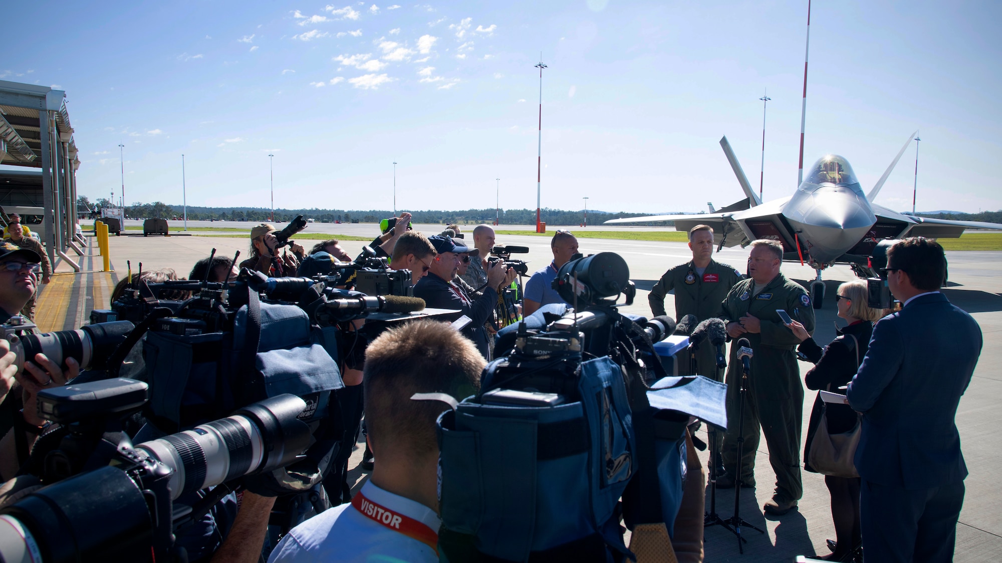 Australian media agencies capture an interview with Royal Australian Air Force Group Capt. Stephen Chappell, Task Unit Headquarters commander, and U.S. Air Force Col. Brian Baldwin, 13th Air Expeditionary Force group commander, July 10, 2019 on RAAF Base Amberley, Australia, in support of Talisman Sabre 19.