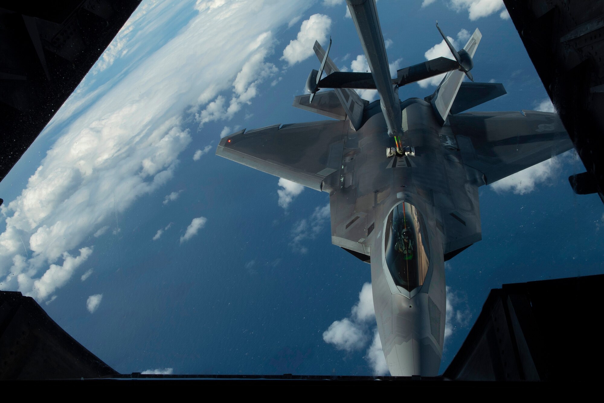 A U.S. Air Force F-22 Raptor is refueled July 14, over the Pacific Ocean near the coast of Brisbane, Australia, in support of Exercise Talisman Sabre 19.