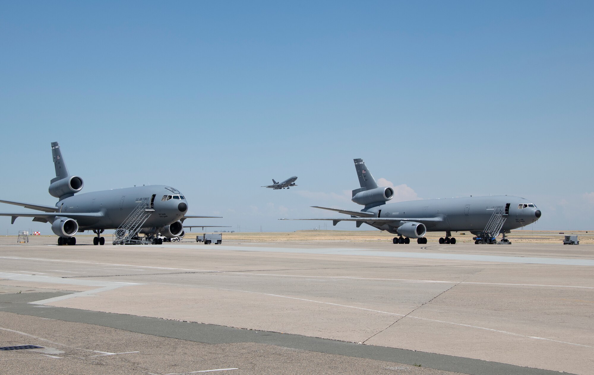 U.S. Air Force Col. Theresa Weems, 60th Operations Group commander, lands a KC-10 Extender during her final flight July 24, 2019, at Travis Air Force Base, California. The flight, which is a military tradition, served as an opportunity for the Travis community to honor Weems and wish her well on her next assignment. Weems has served as the commander for the 60th OG for the largest air mobility wing in the Air Force since July 2017. (U.S. Air Force photo by Heide Couch)