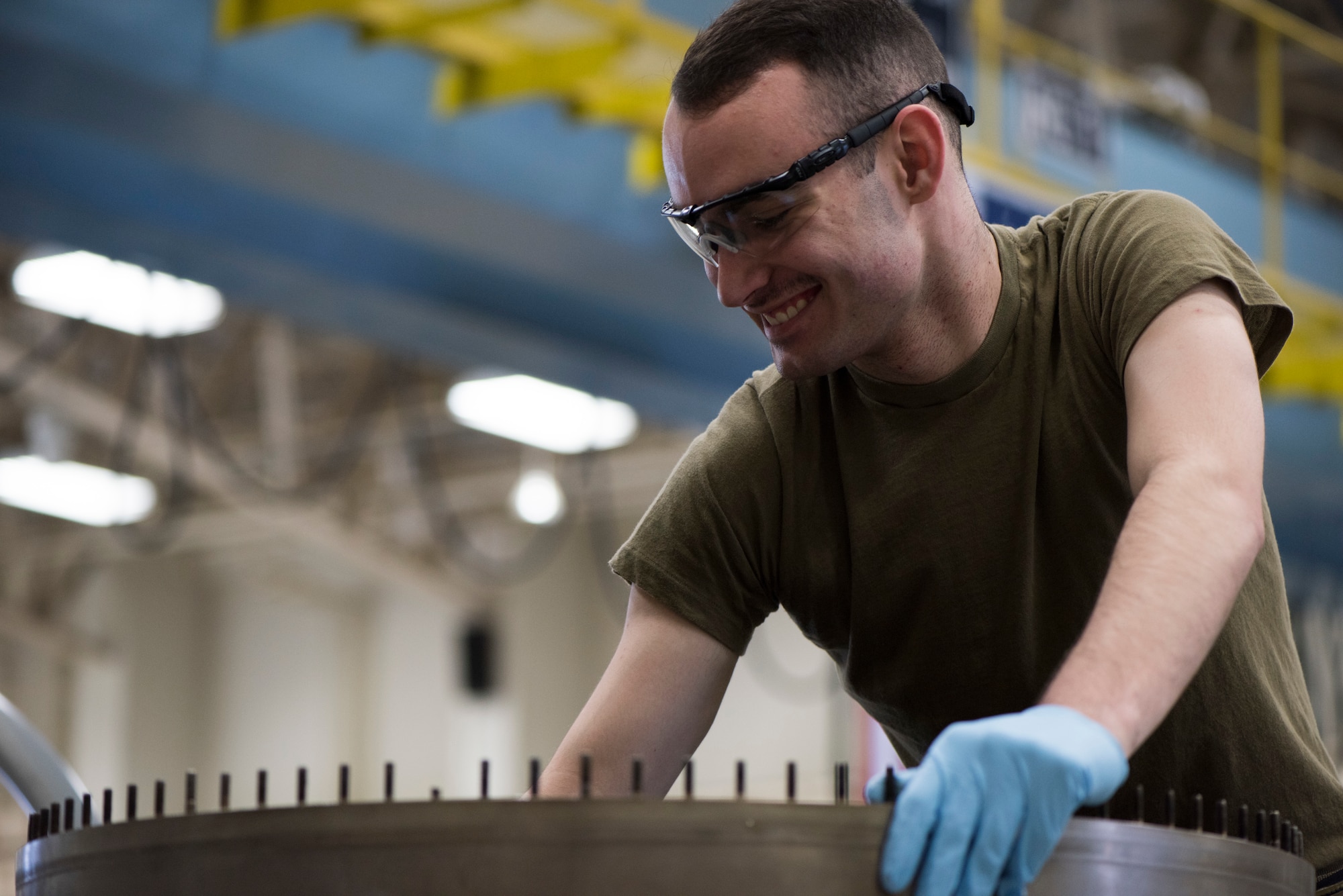 U.S. Air Force Airman 1st Class Connor Howard, a 35th Maintenance Squadron aerospace propulsion journeyman, performs maintenance at Misawa Air Base, Japan, July 16, 2019. Leadership increased their space within the shop by installing a new storage facility, which aided the team in servicing a record breaking number of engines in a month since the late 2000s. (U.S. Air Force photo by Senior Airman Collette Brooks)