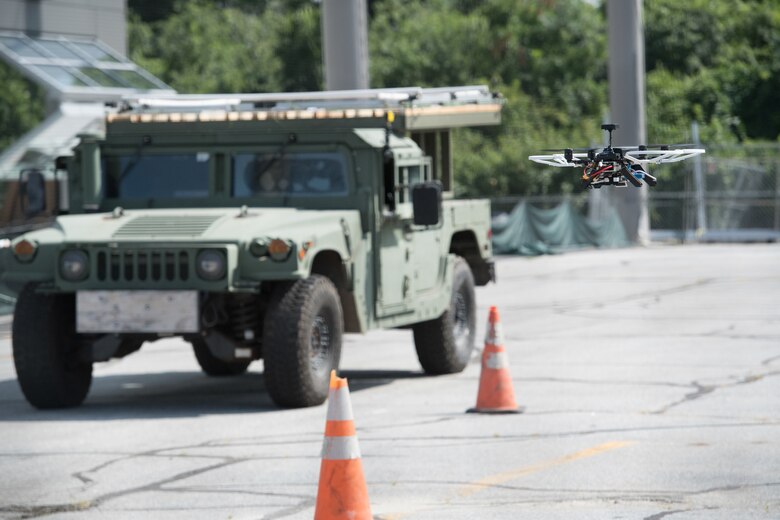 An autonomous drone hovers during the Air Force’s Unmanned Aerial Systems Pitch Day, July 24, at the Northeastern University Innovation Campus in Burlington, Mass. The demonstration of autonomous drone technology was part of a day dedicated to bringing new and innovative companies into the Air Force to work on detecting, tracking, defeating and controlling drones and drone swarms. (U.S. Air Force photo by Todd Maki)