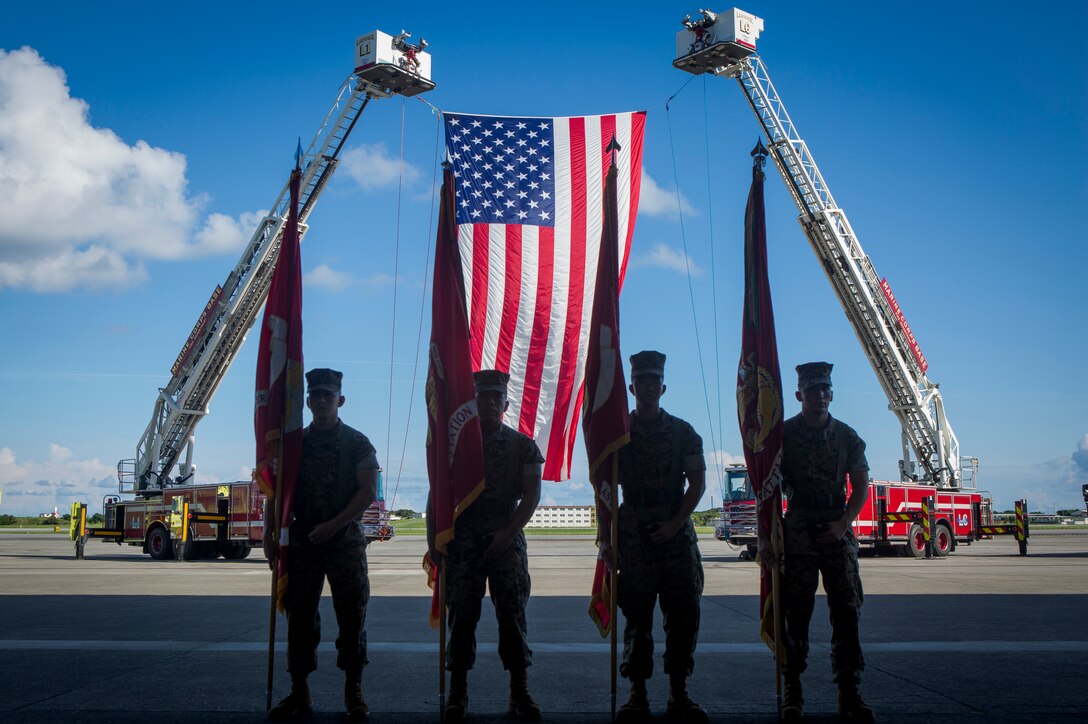 The Color Guard poses for a photo prior to the change of command ceremony for the commanding general of Marine Corps Installations Pacific July 26, 2019 on Marine Corps Air Station Futenma, Okinawa, Japan. Maj. Gen. Paul J. Rock Jr. relinquished command to Brig. Gen. William J. Bowers. (U.S. Marine Corps photo by Lance Cpl. Brennan J. Beauton)