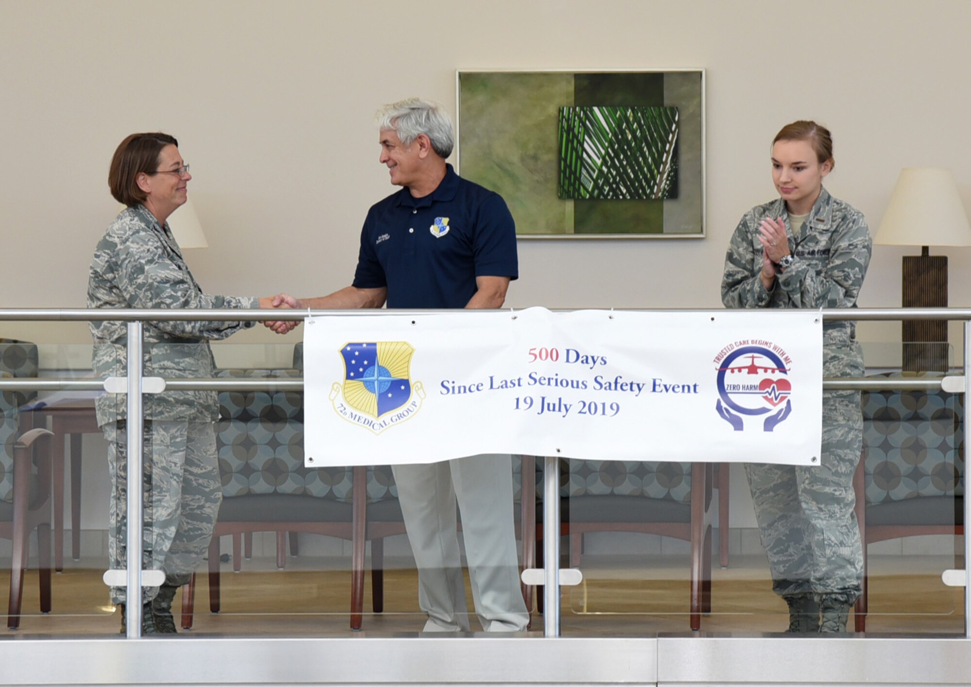 72nd Medical Group Commander, Col. Jennifer L. Trinkle, officiated a ceremony commemorating milestone days without a Serious Safety Event. The 500 days banner was unfurled by Bob Sandlin, 72nd Air Base Wing director of staff and Lt. Madison Rauenbuehler, 72nd Medical Group Medical Readiness flight commander. (U.S. Air Force photos/Kelly White)