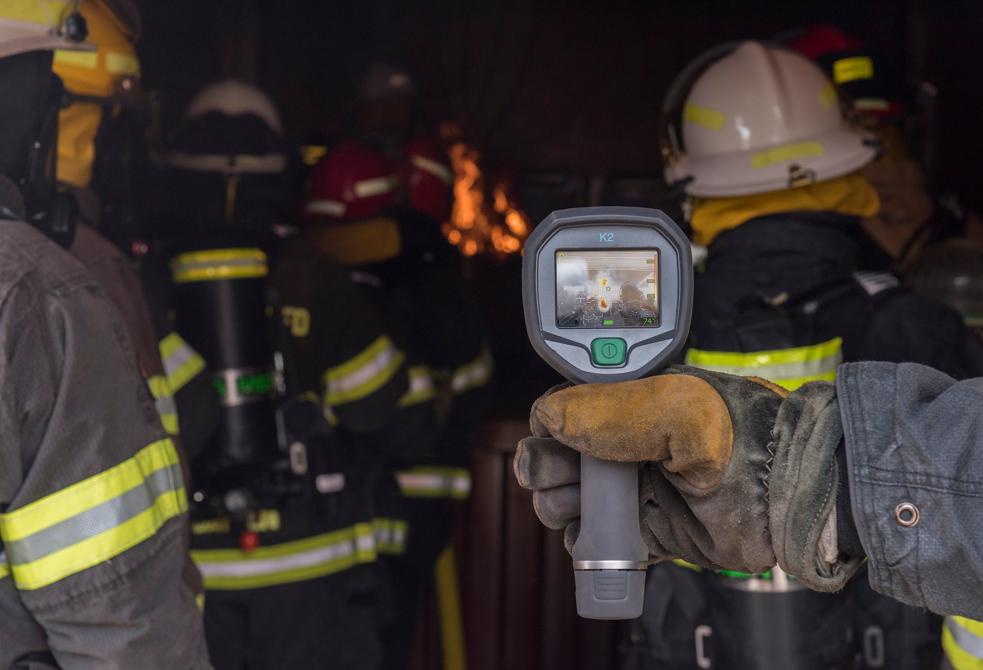 RAF Alconbury firefighters use new fire behavior trainer to practice techniques for safely fighting fires at RAF Alconbury, England, July 17, 2019. (U.S. Air Force photo by Airman 1st Class Jennifer Zima)