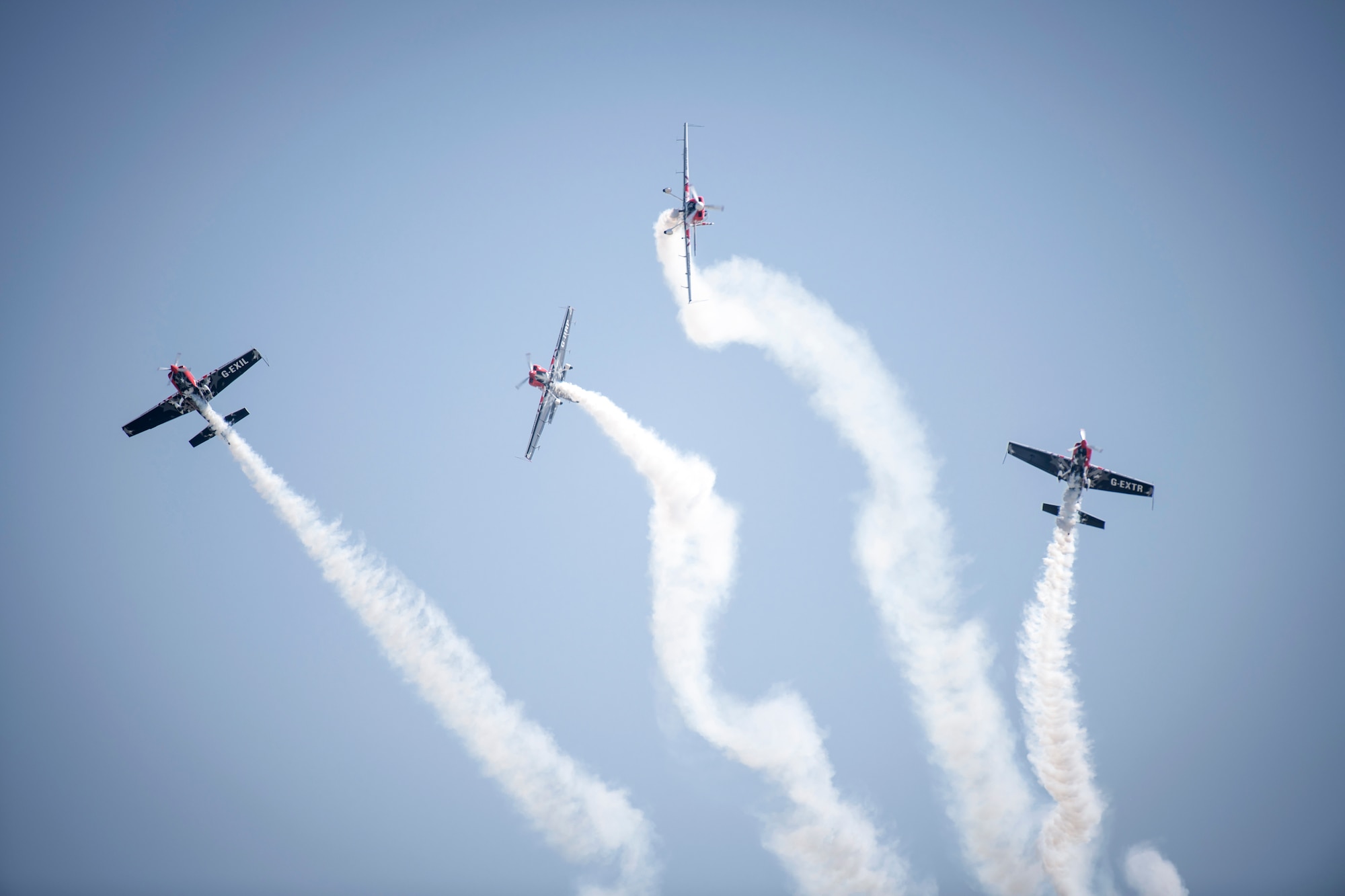 The Global Stars air acrobatic team perform during the Families and Friends Day at RAF Marham, England, July 25, 2019. The day is all about saying "thank you," to the RAF personnel's families and friends in the local community who support the installation. (U.S. Air Force photo by Tech. Sgt. Emerson Nuñez)