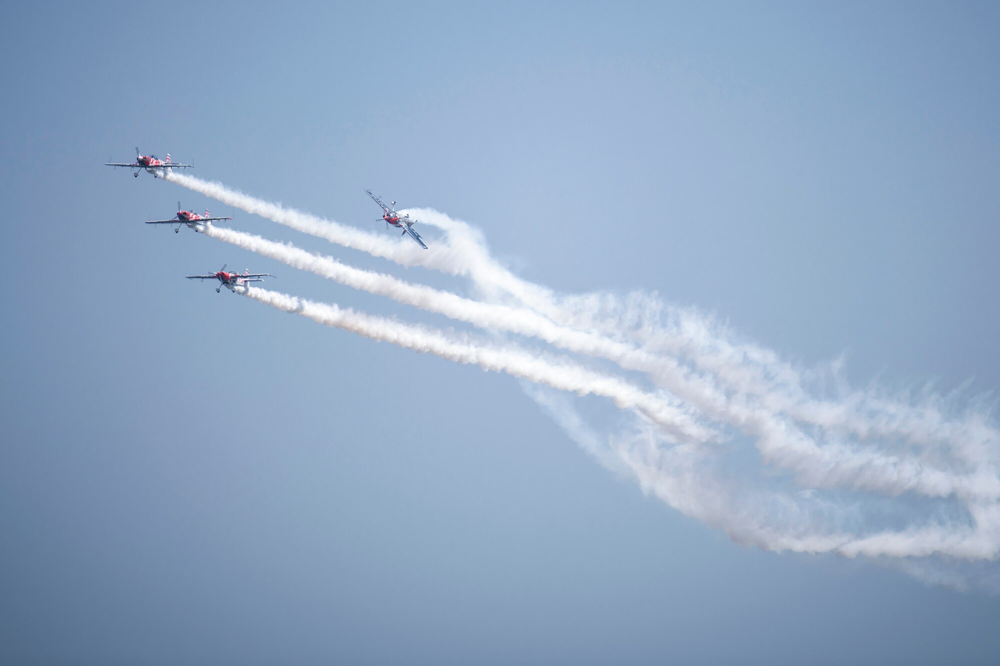 The Global Stars air acrobatic team perform during the Families and Friends Day at RAF Marham, England, July 25, 2019. Airmen from RAFs Lakenheath and Mildenhall were invited to celebrate and help build a closer partnership between bases. (U.S. Air Force photo by Tech. Sgt. Emerson Nuñez)