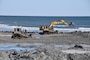 Construction equipment pushes sand into an engineered beach template as part of the 2017 periodic nourishment of the Cape May to Lower Township project.