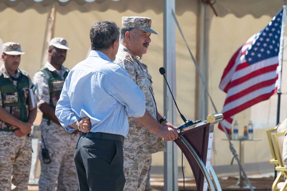 Jordan Armed Forces Brig. Gen. Khalid Al-Masaeid (right), Northern region commander, speaks to New Jersey National Guard Soldiers, with 1st Squadron, 102nd Calvary Regiment, and Jordan Border Guard Force Soldiers, with the 7th Mechanized Battalion, 48th Mechanized Brigade, during the Jordan Operational Engagement Program (JOEP) opening ceremony July 14, 2019. JOEP is a 14-week individual and collective training, as well as a military partnership between Jordan and America.