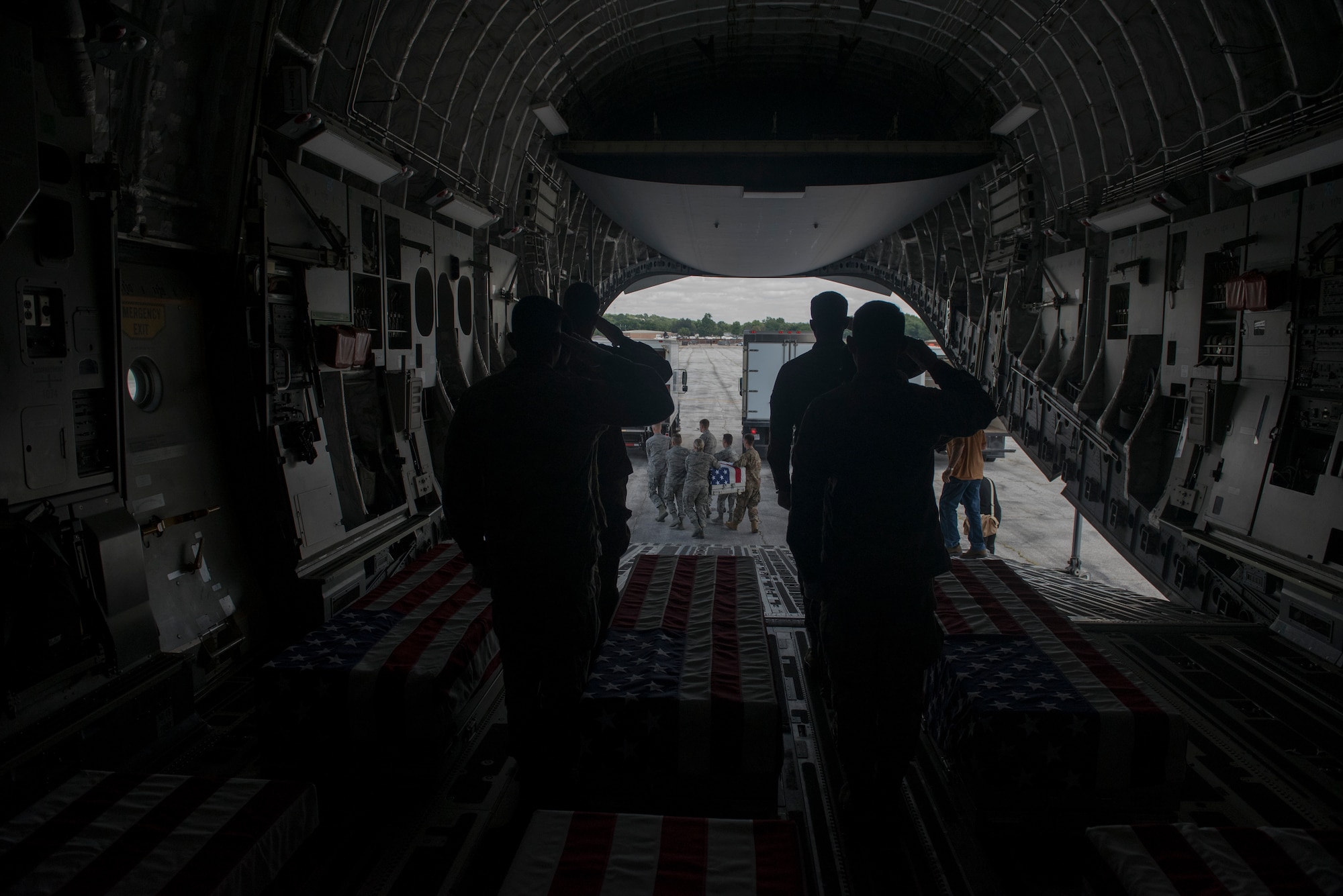 A team of Offutt Honor Guardsmen carry a casket containing the remains of a World War II service member during a dignified transfer July 23, 2019. For additional images of the transfer, visit https://www.flickr.com/photos/offutt_afb/albums/72157709886860852